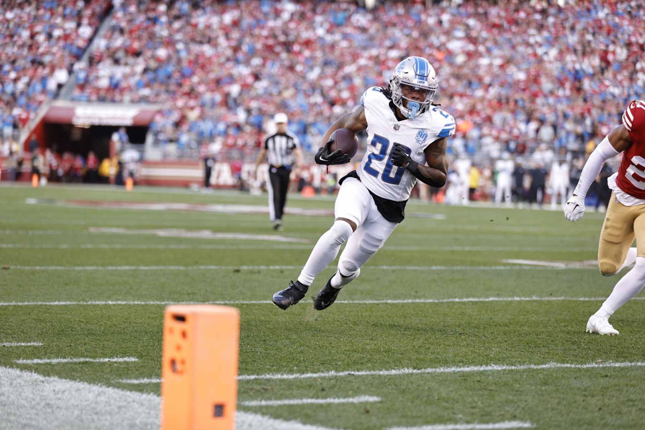 SANTA CLARA, CA - JANUARY 28: Jahmyr Gibbs #26 of the Detroit Lions rushes during the NFC Championship game against the San Francisco 49ers at Levi's Stadium on January 28, 2024 in Santa Clara, California. The 49ers defeated the Lions 34-31. (Photo by Michael Zagaris/San Francisco 49ers/Getty Images)