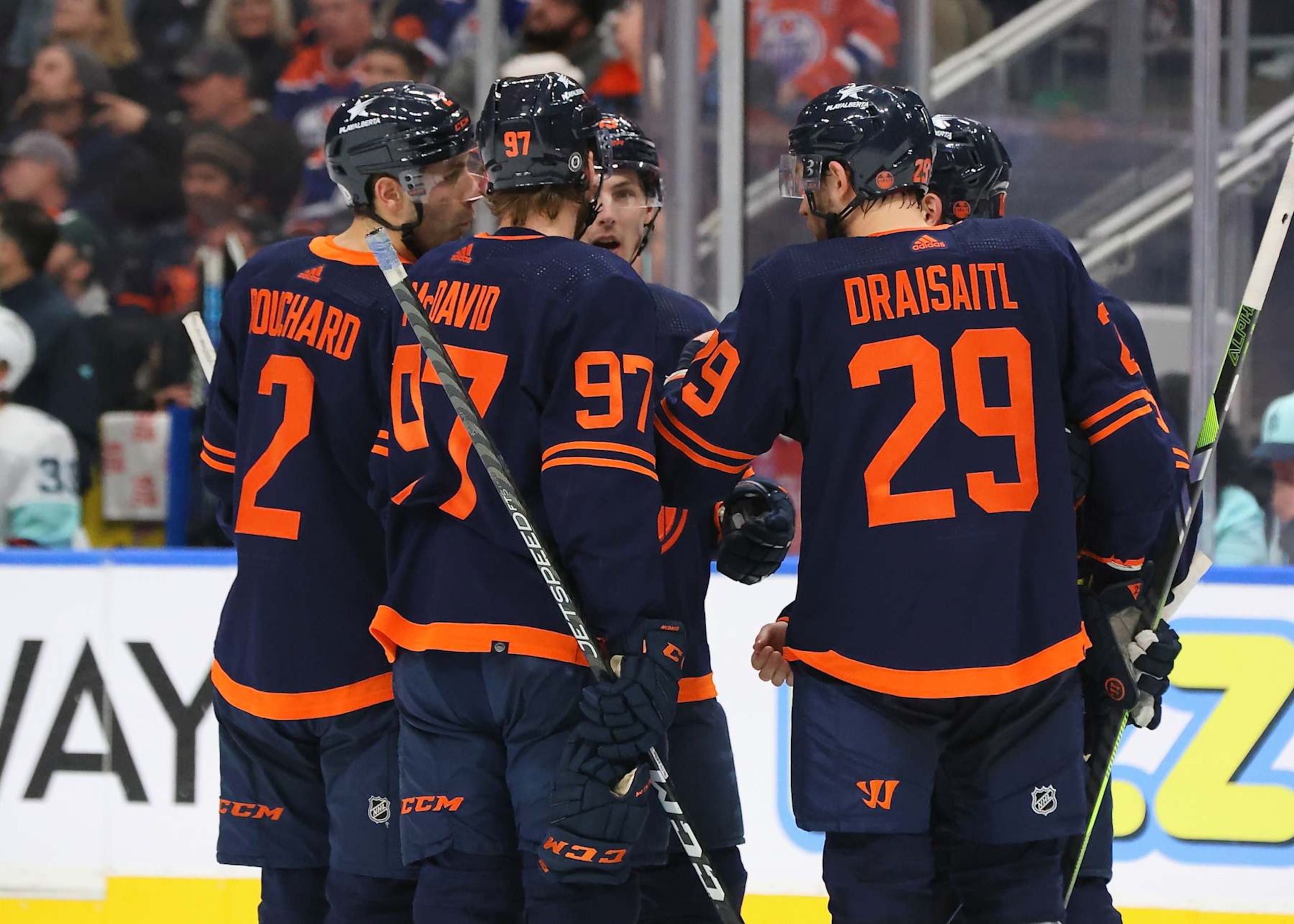 Evan Bouchard, Connor McDavid and Leon Draisaitl