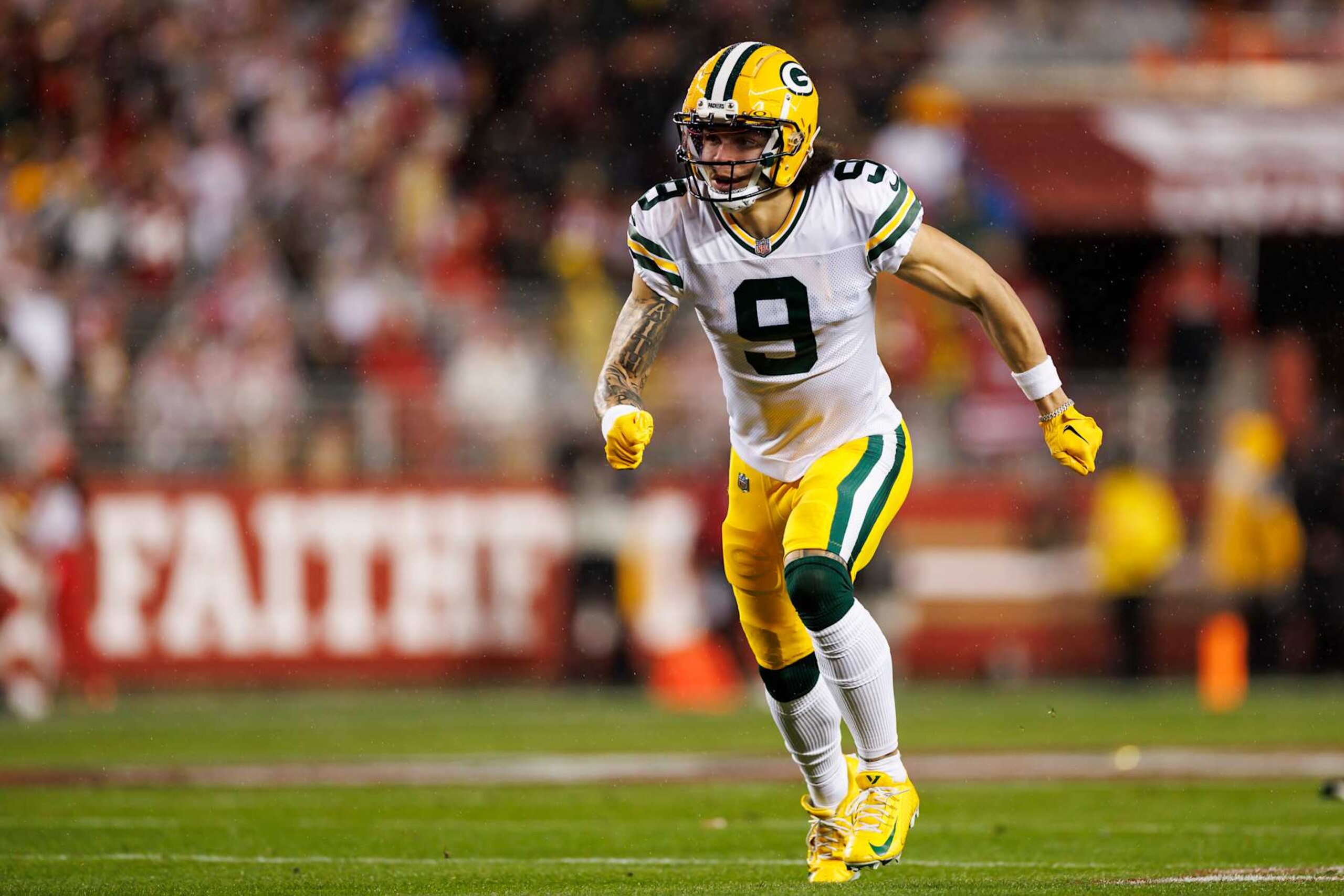 SANTA CLARA, CALIFORNIA - JANUARY 20: Christian Watson #9 of the Green Bay Packers runs a route during an NFC divisional round playoff football game against the San Francisco 49ers at Levi's Stadium on January 20, 2024 in Santa Clara, California. (Photo by Ryan Kang/Getty Images)