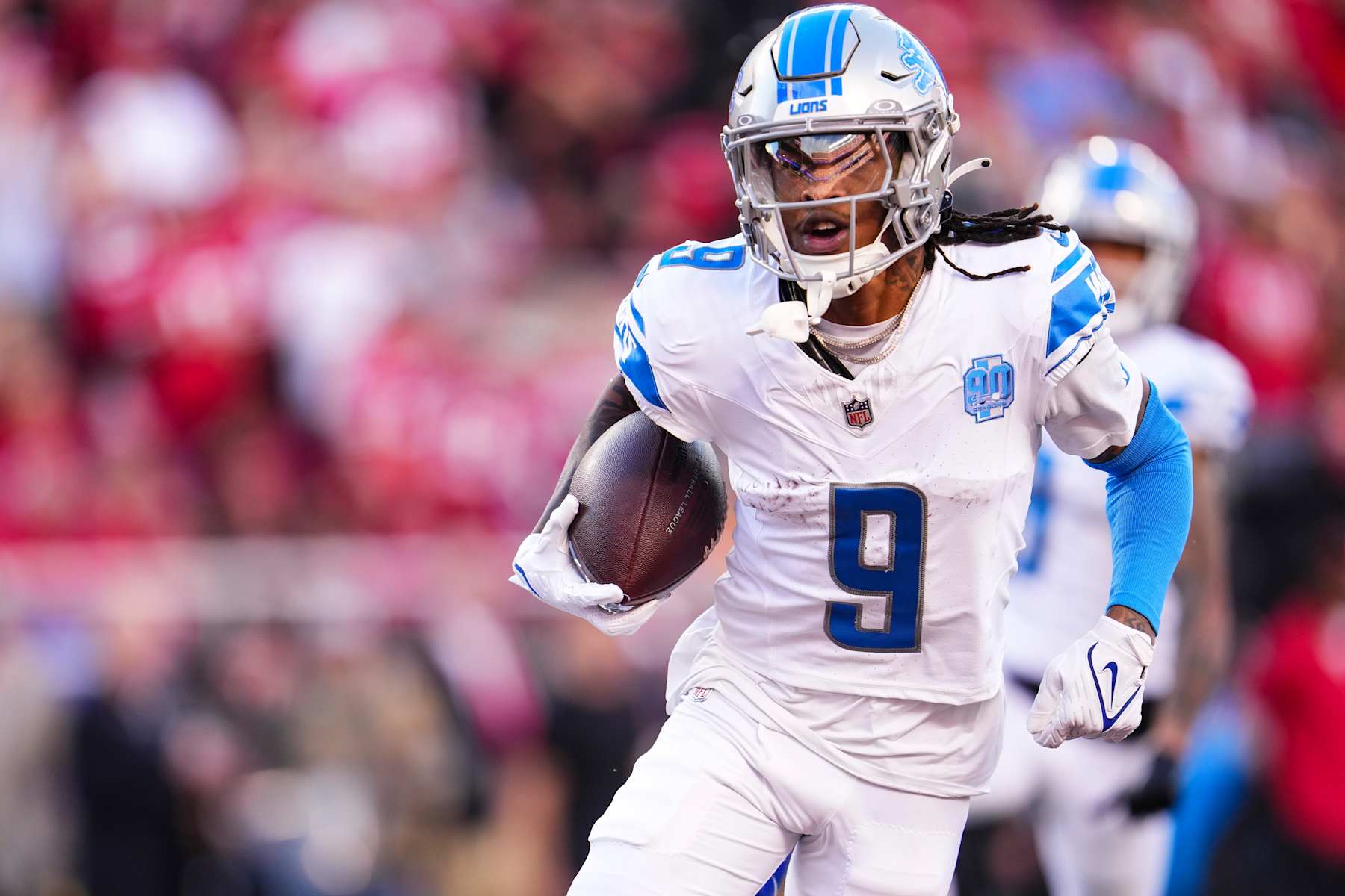 SANTA CLARA, CA - JANUARY 28: Jameson Williams #9 of the Detroit Lions runs the ball during the NFC Championship NFL football game against the San Francisco 49ers at Levi's Stadium on January 28, 2024 in Santa Clara, California. (Photo by Cooper Neill/Getty Images)