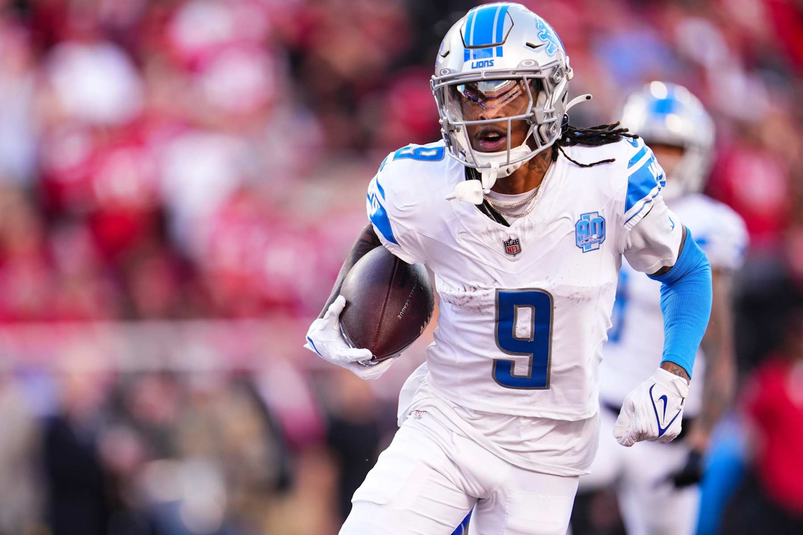 SANTA CLARA, CA - JANUARY 28: Jameson Williams #9 of the Detroit Lions runs the ball during the NFC Championship NFL football game against the San Francisco 49ers at Levi's Stadium on January 28, 2024 in Santa Clara, California. (Photo by Cooper Neill/Getty Images)