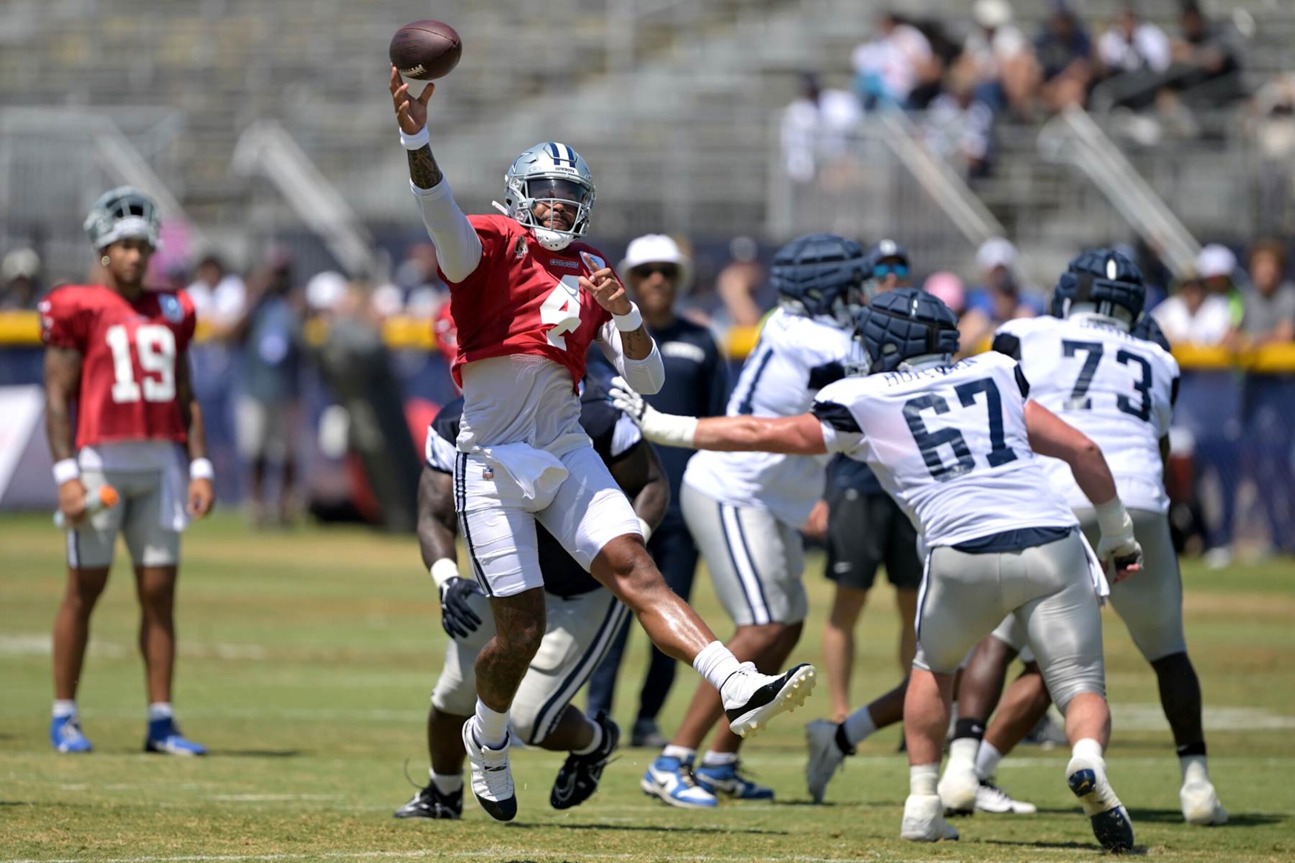 OXNARD, CALIFORNIA - AUGUST 6: Dak Prescott #4 of the Dallas Cowboys participates in drills during NFL training camp at River Ridge Fields on August 6, 2024 in Oxnard, California. (Photo by Jayne Kamin-Oncea/Getty Images)