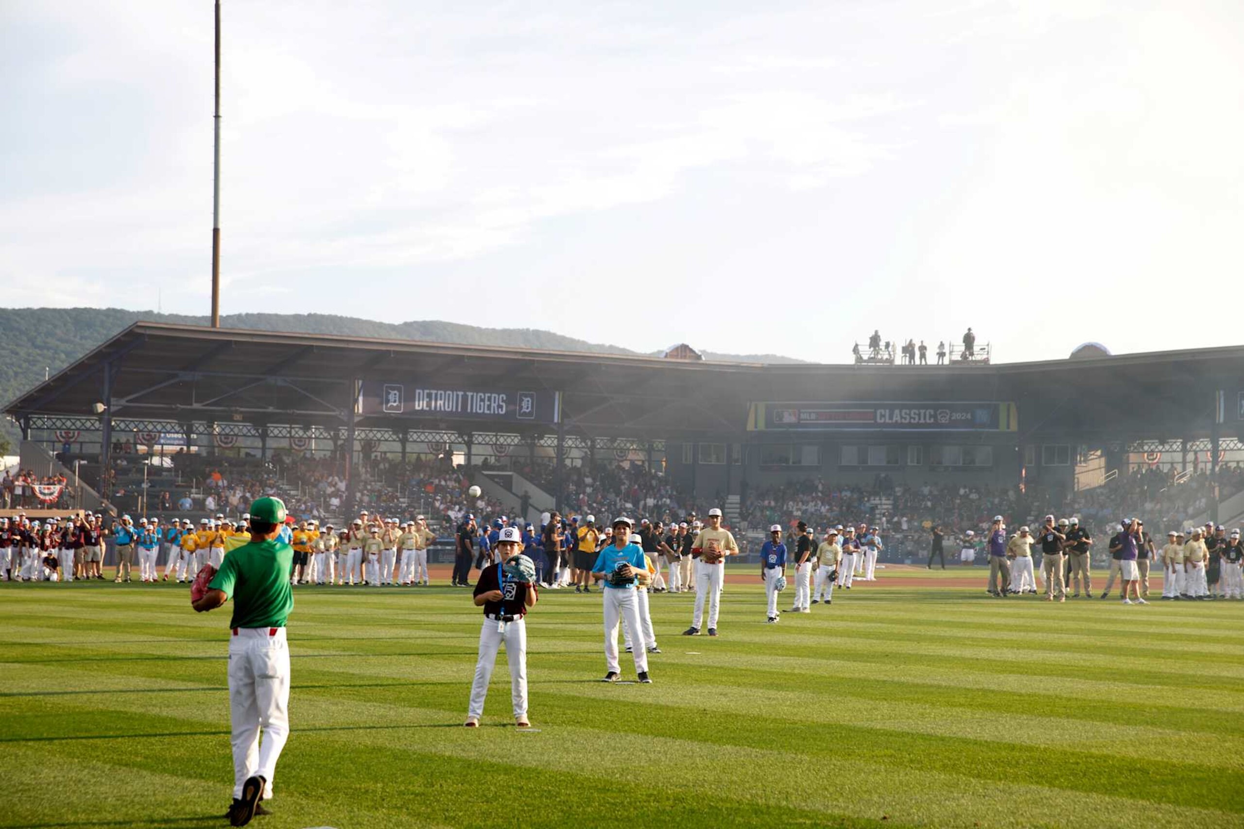 WILLIAMSPORT , PA - AUGUST 18:  Participants in the 2024 Little League International World Series throw out tthe ceremonial first pitch prior to the 2024 Little League Classic game between the New York Yankees and the Detroit Tigers at Journey Bank Ballpark at Historic Bowman Field on Sunday, August 18, 2024 in Williamsport , Pennsylvania. (Photo by Rob Tringali/MLB Photos via Getty Images)