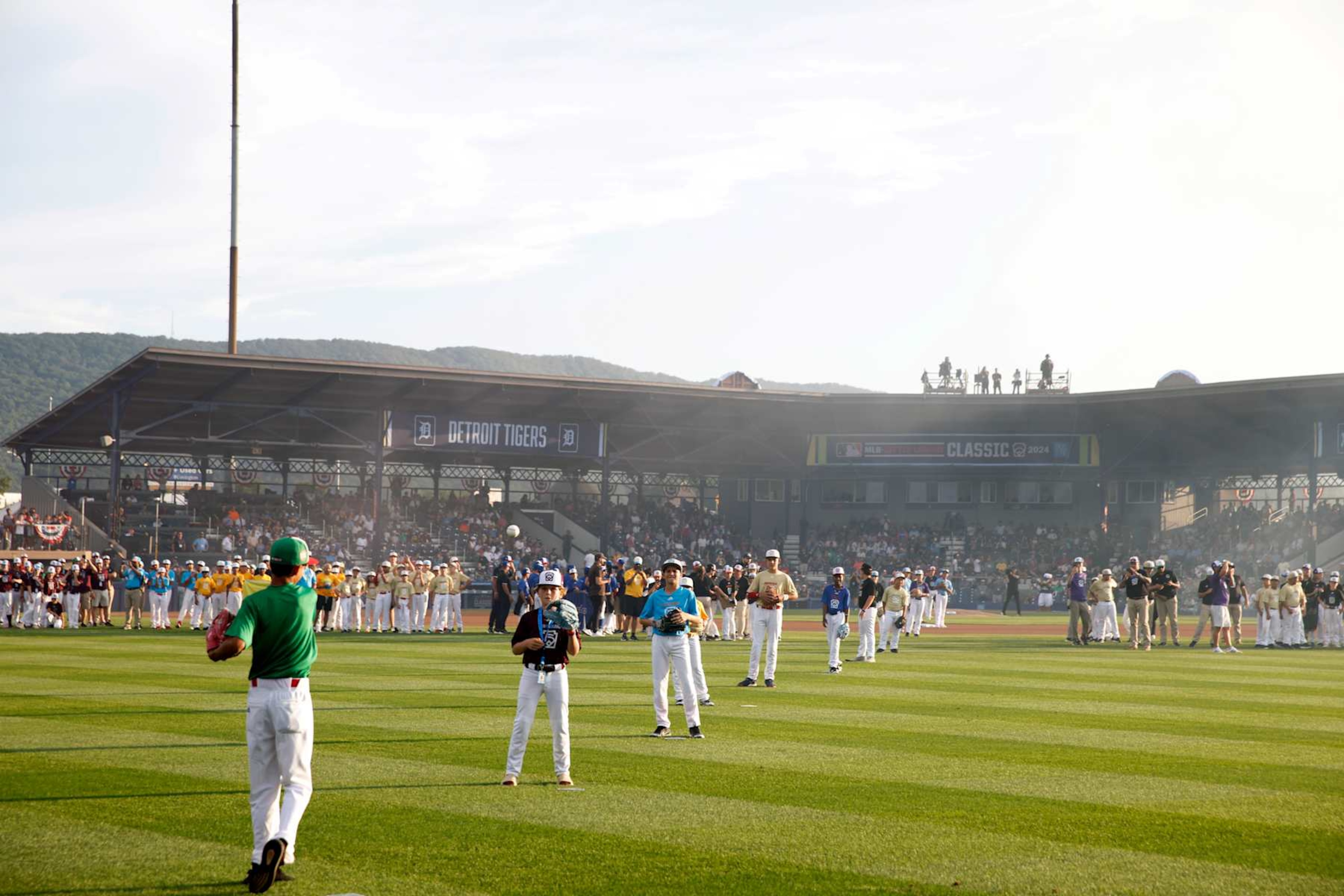 WILLIAMSPORT , PA - AUGUST 18:  Participants in the 2024 Little League International World Series throw out tthe ceremonial first pitch prior to the 2024 Little League Classic game between the New York Yankees and the Detroit Tigers at Journey Bank Ballpark at Historic Bowman Field on Sunday, August 18, 2024 in Williamsport , Pennsylvania. (Photo by Rob Tringali/MLB Photos via Getty Images)