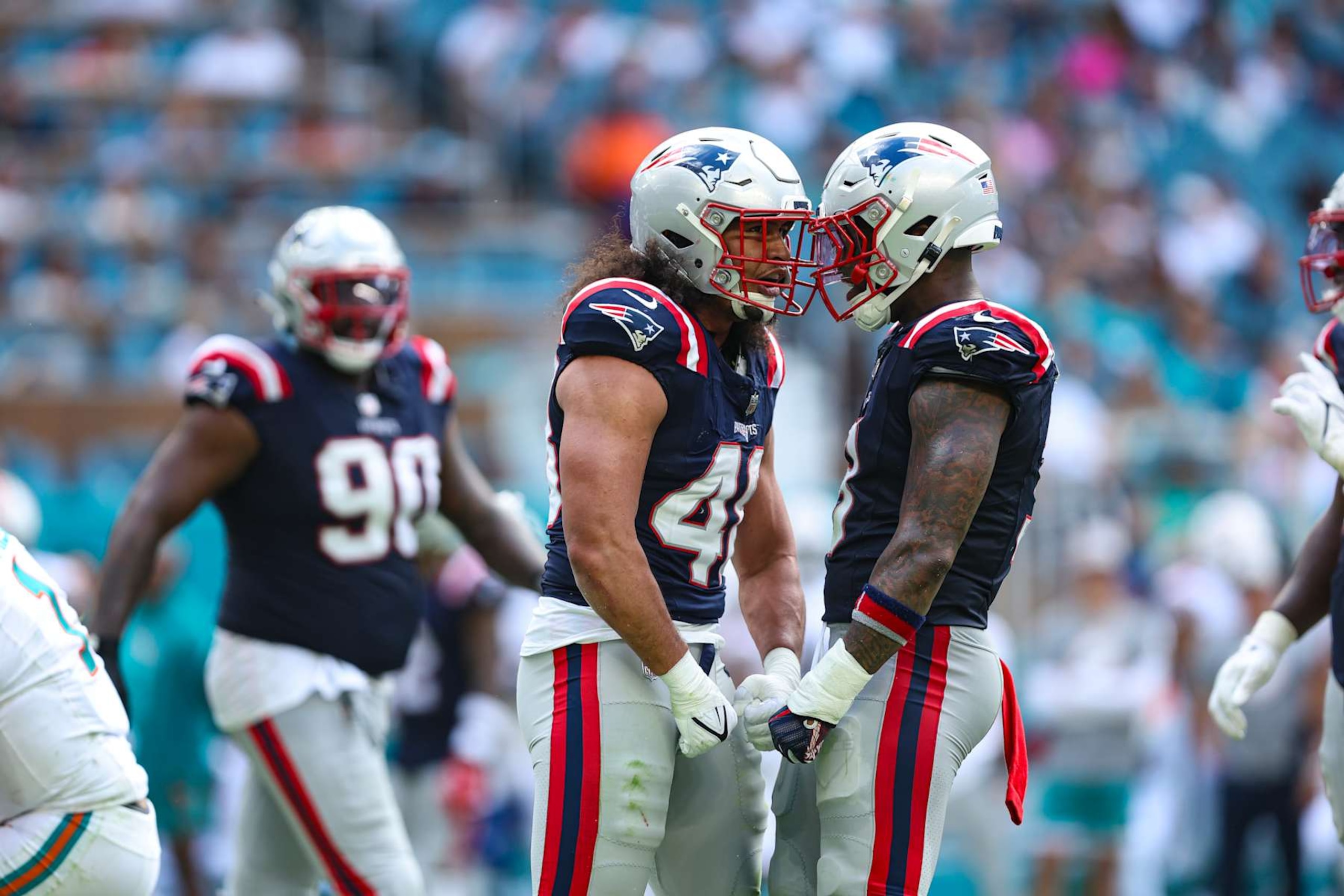 MIAMI GARDENS, FL - OCTOBER 29: Jahlani Tavai #48 of the New England Patriots celebrates during an NFL football game against the Miami Dolphins at Hard Rock Stadium on October 29, 2023 in Miami Gardens, Florida. (Photo by Perry Knotts/Getty Images)
