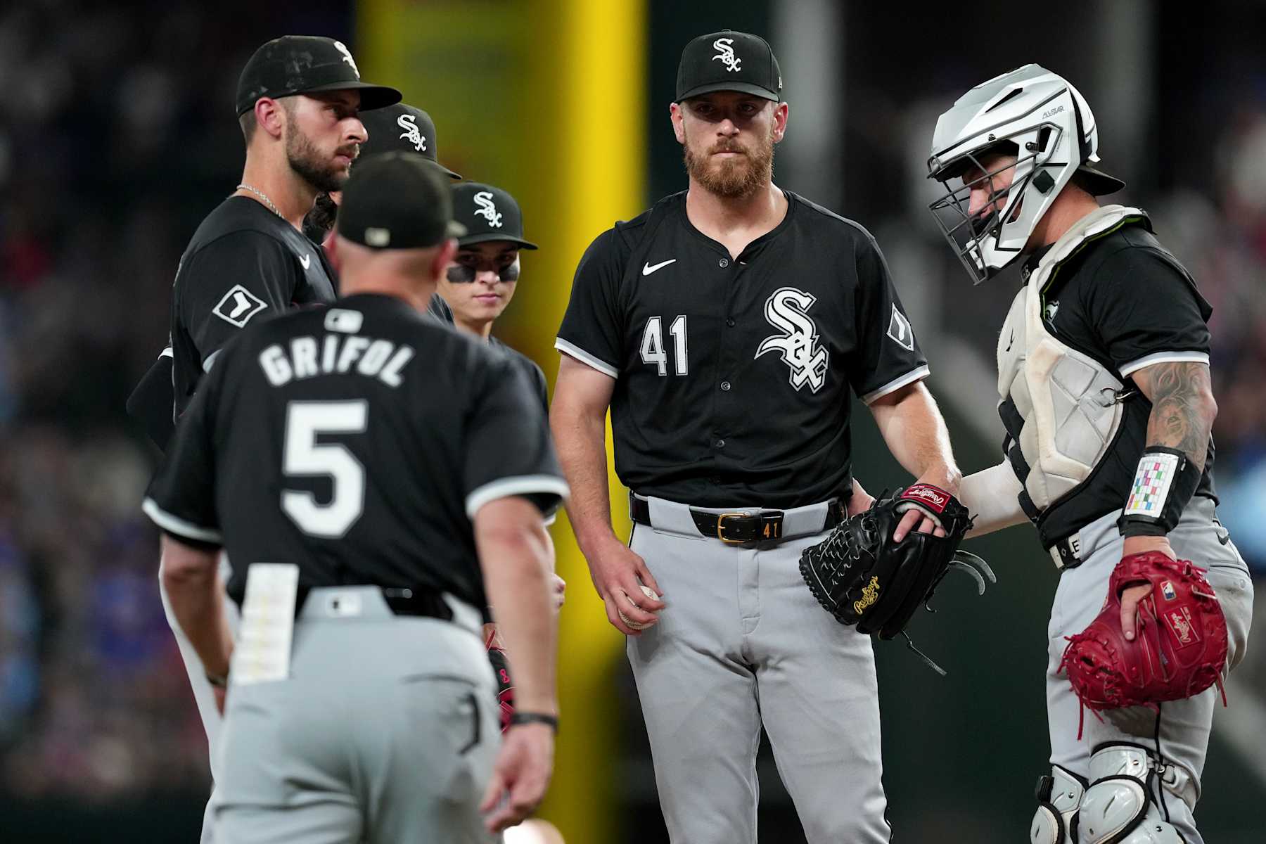 ARLINGTON, TEXAS - JULY 23: Chad Kuhl #41 of the Chicago White Sox looks on as manager Pedro Grifol #5 walks to the mound during the seventh inning against the Texas Rangers at Globe Life Field on July 23, 2024 in Arlington, Texas. (Photo by Sam Hodde/Getty Images)