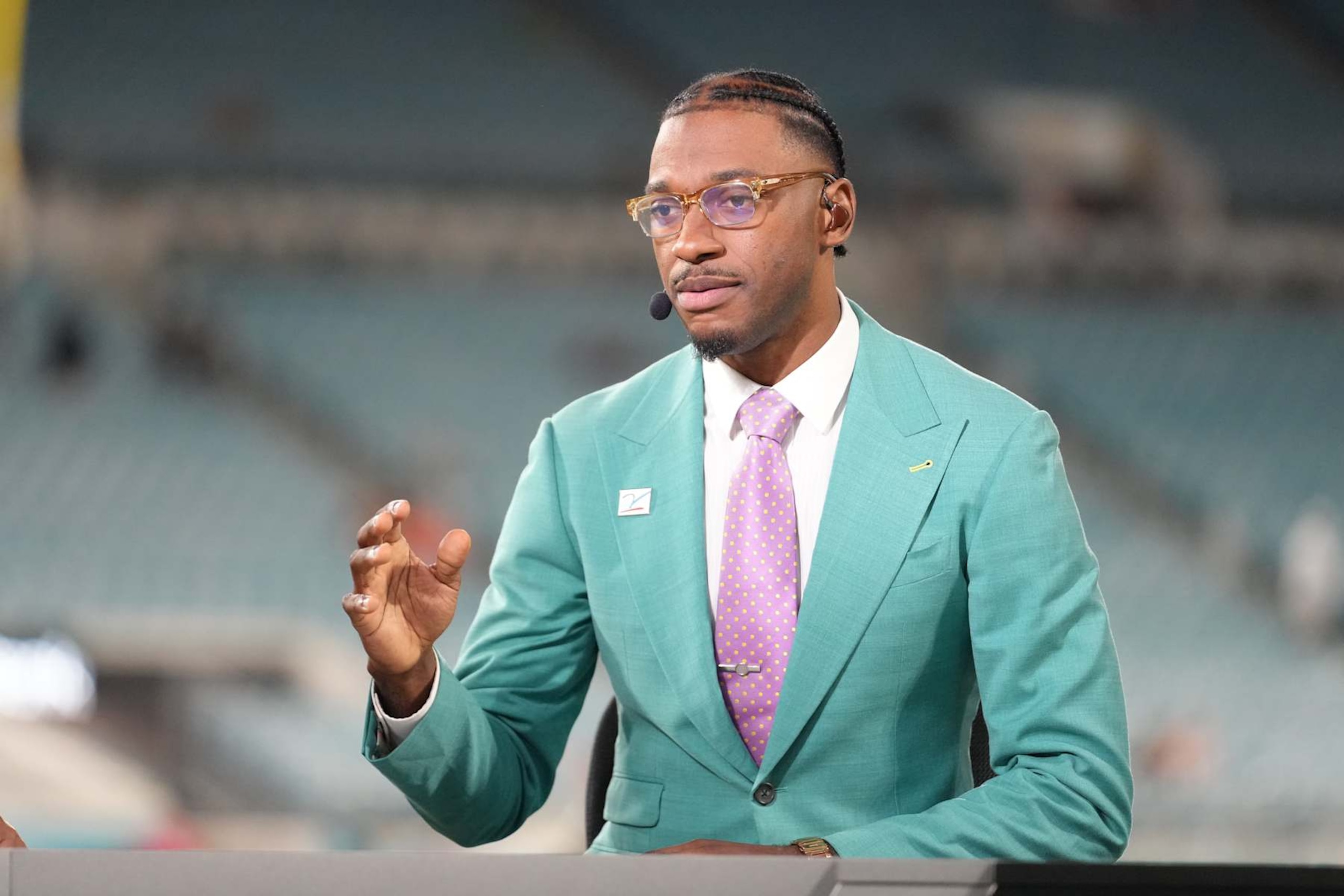 JACKSONVILLE, FL - DECEMBER 04: ESPN's Robert Griffin III chats with colleagues on air before the game between the Cincinnati Bengals and the Jacksonville Jaguars on Monday, December 4, 2023, EverBank Stadium, Jacksonville, Fla. (Photo by Peter Joneleit/Icon Sportswire via Getty Images) JACKSONVILLE, FL - DECEMBER 04: ESPN's Robert Griffin III chats with colleagues on air before the game between the Cincinnati Bengals and the Jacksonville Jaguars on Monday, December 4, 2023, EverBank Stadium, Jacksonville, Fla. (Photo by Peter Joneleit/Icon Sportswire via Getty Images)