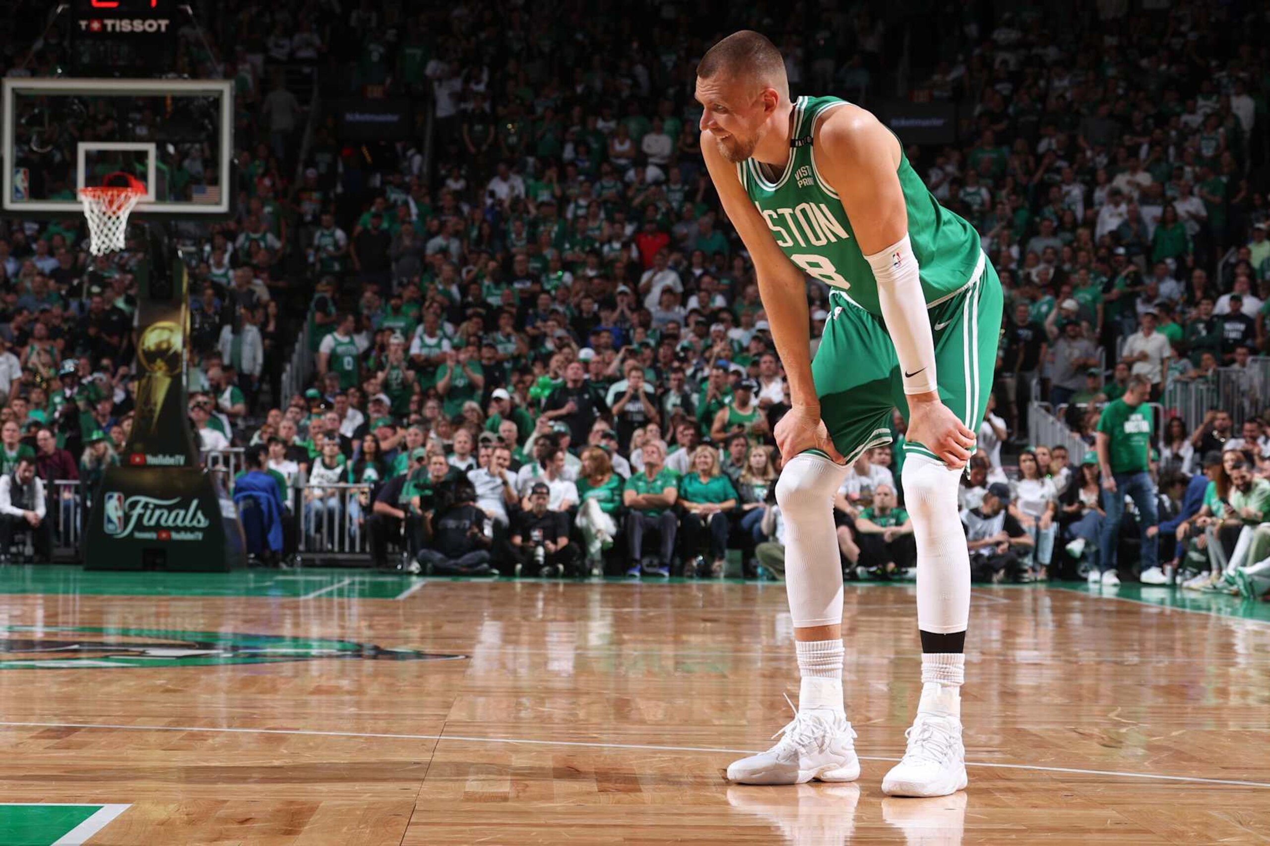 BOSTON, MA - JUNE 17: Kristaps Porzingis #8 of the Boston Celtics looks on during the game against the Dallas Mavericks during Game 5 of the 2024 NBA Finals on June 17, 2024 at the TD Garden in Boston, Massachusetts. NOTE TO USER: User expressly acknowledges and agrees that, by downloading and or using this photograph, User is consenting to the terms and conditions of the Getty Images License Agreement. Mandatory Copyright Notice: Copyright 2024 NBAE  (Photo by Nathaniel S. Butler/NBAE via Getty Images)