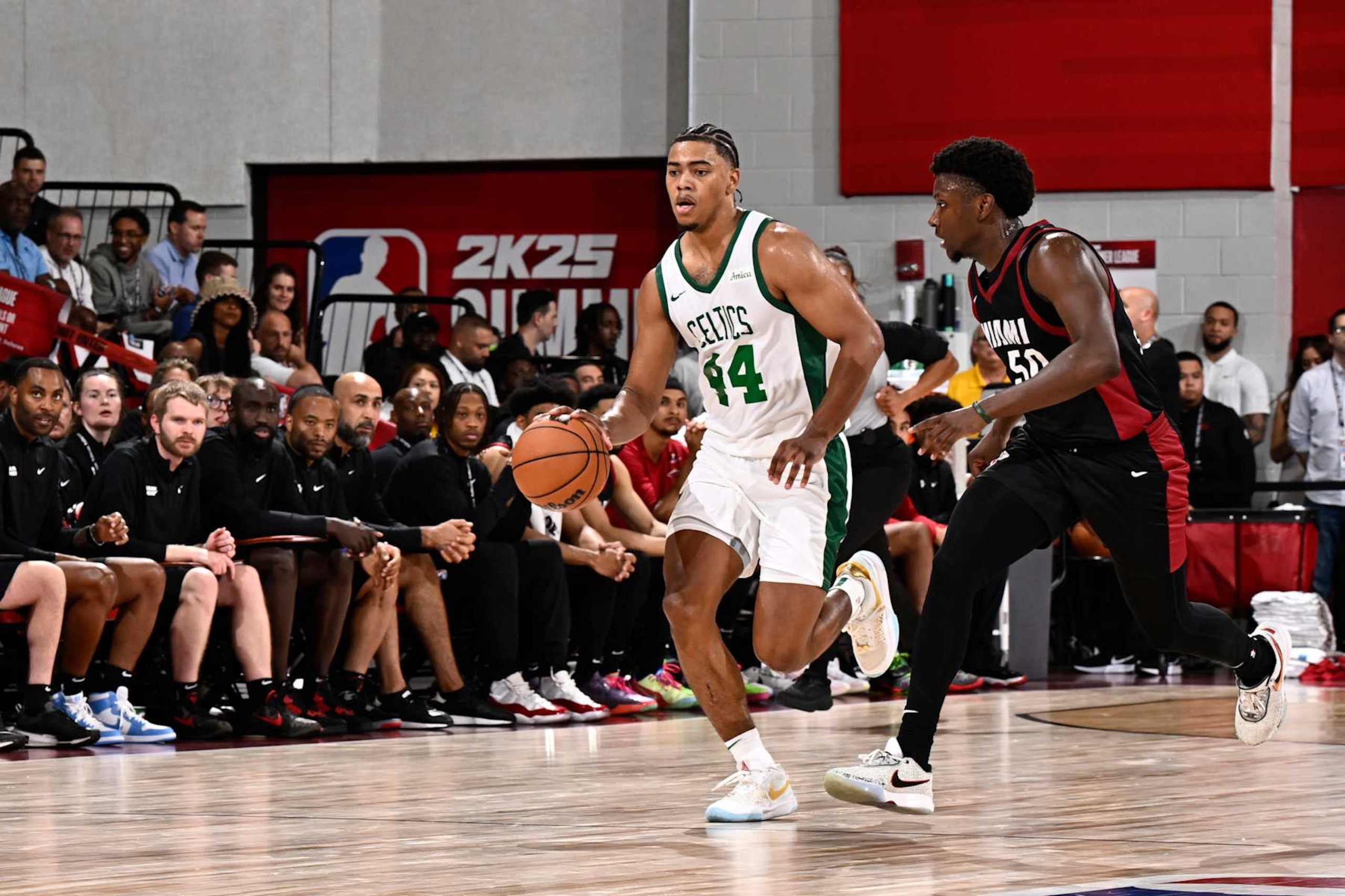 LAS VEGAS, NV - JULY 13: Jaden Springer #44 of the Boston Celtics dribbles the ball during the game against the Miami Heat on July 13, 2024 at The Pavilion in Las Vegas, Nevada. NOTE TO USER: User expressly acknowledges and agrees that, by downloading and or using this photograph, User is consenting to the terms and conditions of the Getty Images License Agreement. Mandatory Copyright Notice: Copyright 2024 NBAE (Photo by David Dow/NBAE via Getty Images)