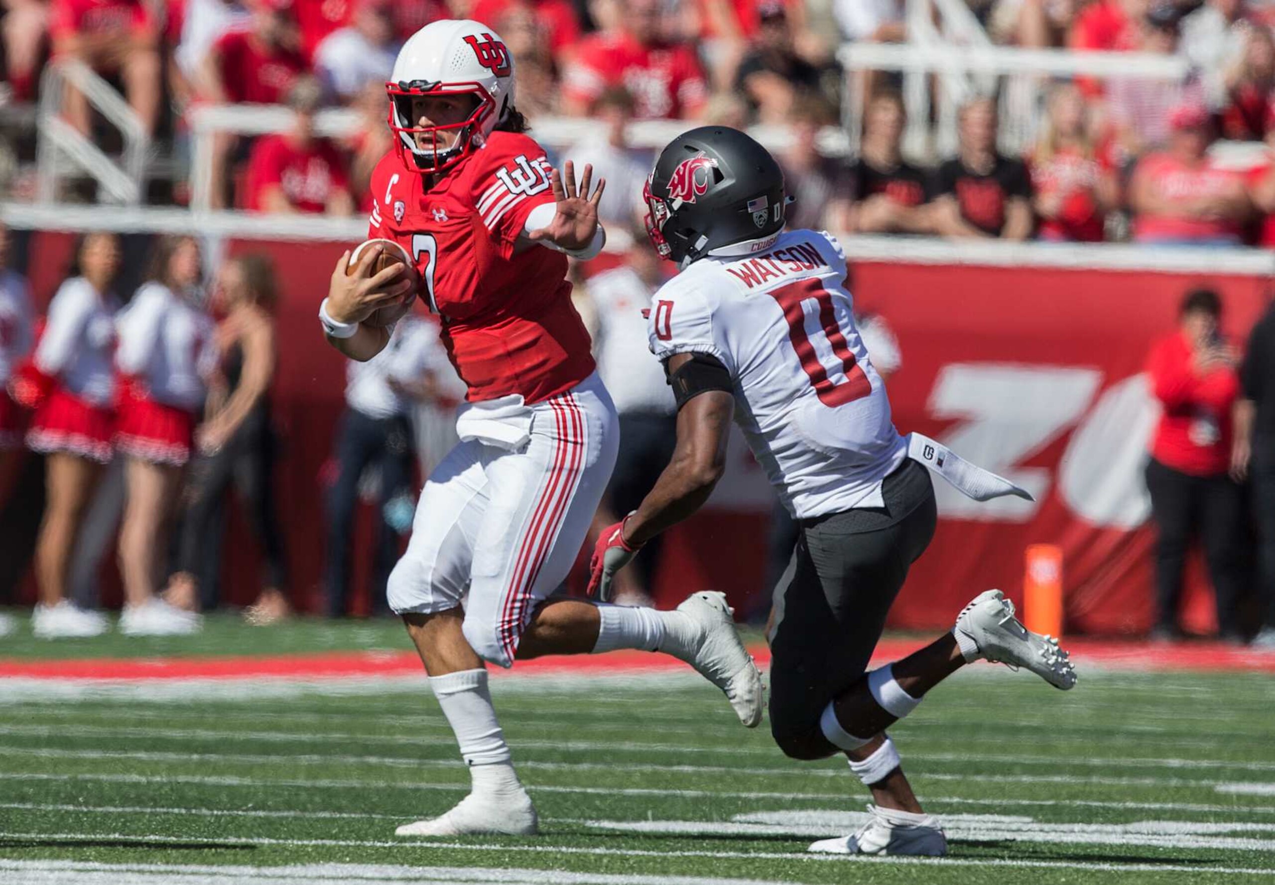SALT LAKE CITY, UT - SEPTEMBER 25 : Cam Rising #7 of the Utah Utes rushes out of the pocket under pressure from Jaylen Watson #0 of the Washington State Cougars during their game September 25, 2021 at Rice Eccles Stadium in Salt Lake City, Utah. (Photo by Chris Gardner/Getty Images) SALT LAKE CITY, UT - SEPTEMBER 25 : Cam Rising #7 of the Utah Utes rushes out of the pocket under pressure from Jaylen Watson #0 of the Washington State Cougars during their game September 25, 2021 at Rice Eccles Stadium in Salt Lake City, Utah. (Photo by Chris Gardner/Getty Images)