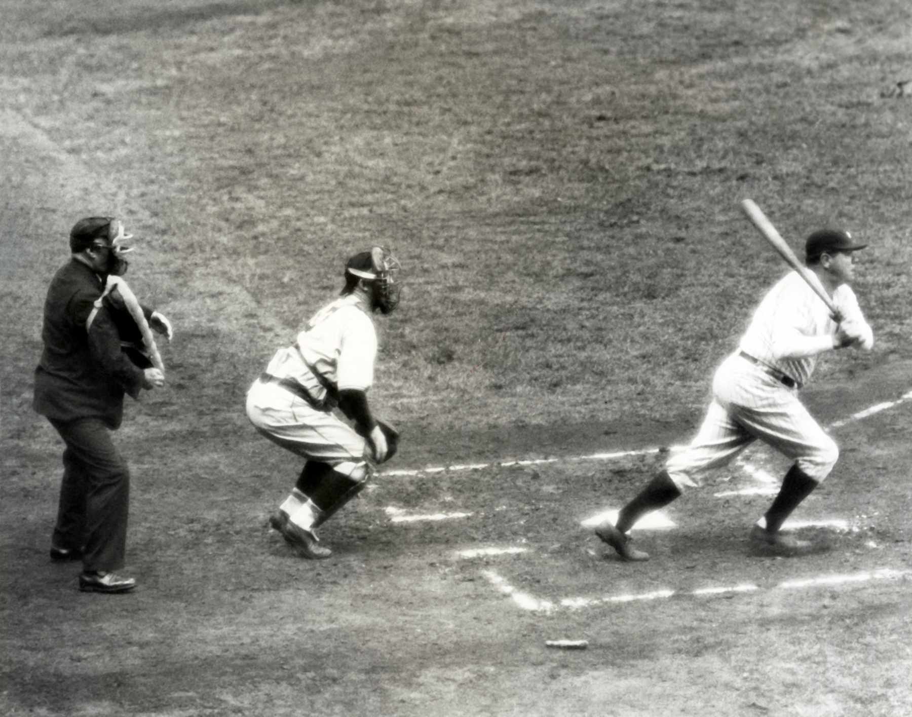 BRONX, NY - OCTOBER, 1932:  Babe Ruth #3 of the New York Yankees swings at a picth as catcher Gabby Hartnett #7 of the Chicago Cubs follows the ball during the 1932 World Series at Yankee Stadium in Bronx, New York.  (Photo by B Bennett/Getty Images)