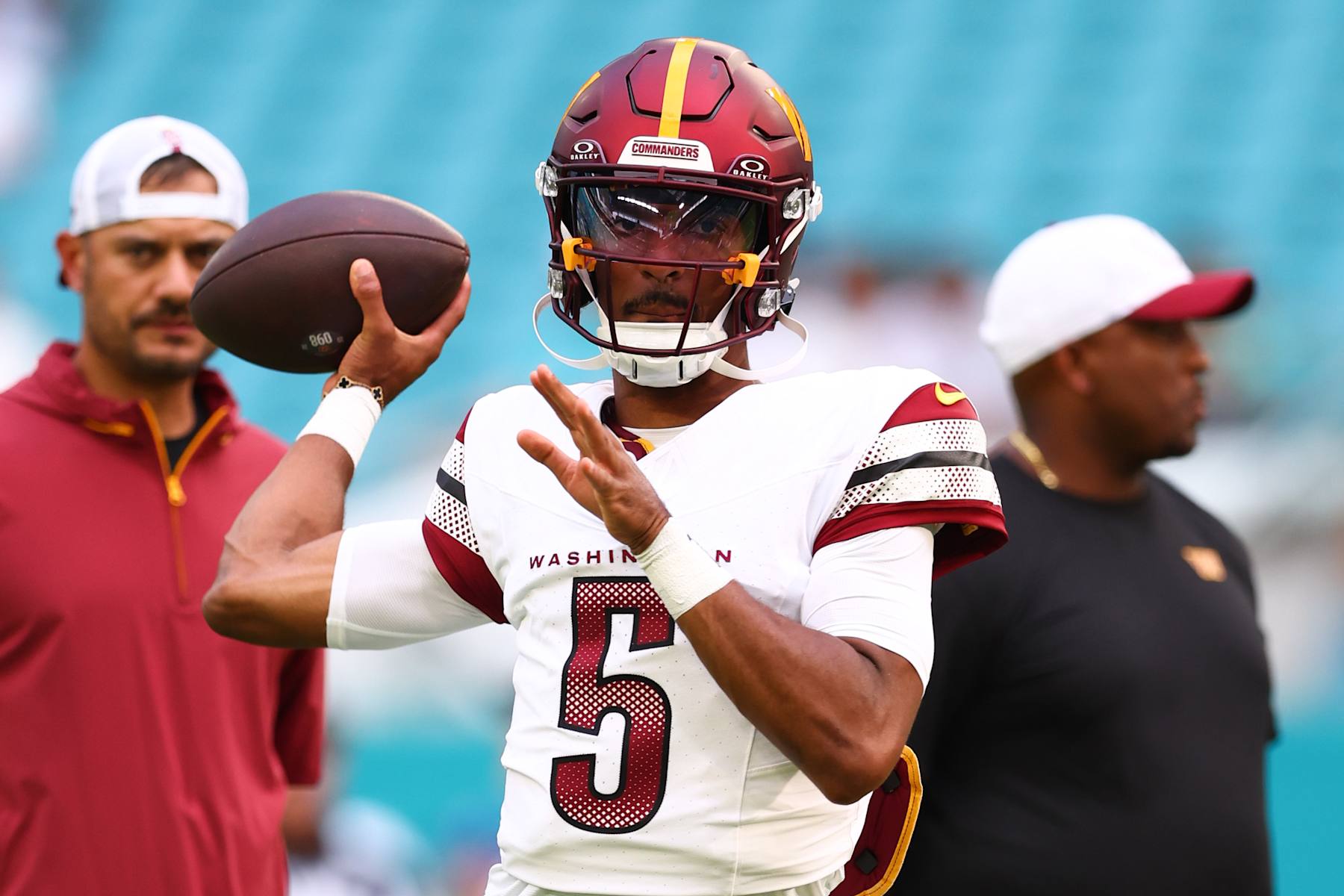 MIAMI GARDENS, FLORIDA - AUGUST 17: Jayden Daniels #5 of the Washington Commanders warms up prior to playing a preseason game against the Miami Dolphins at Hard Rock Stadium on August 17, 2024 in Miami Gardens, Florida. (Photo by Megan Briggs/Getty Images)
