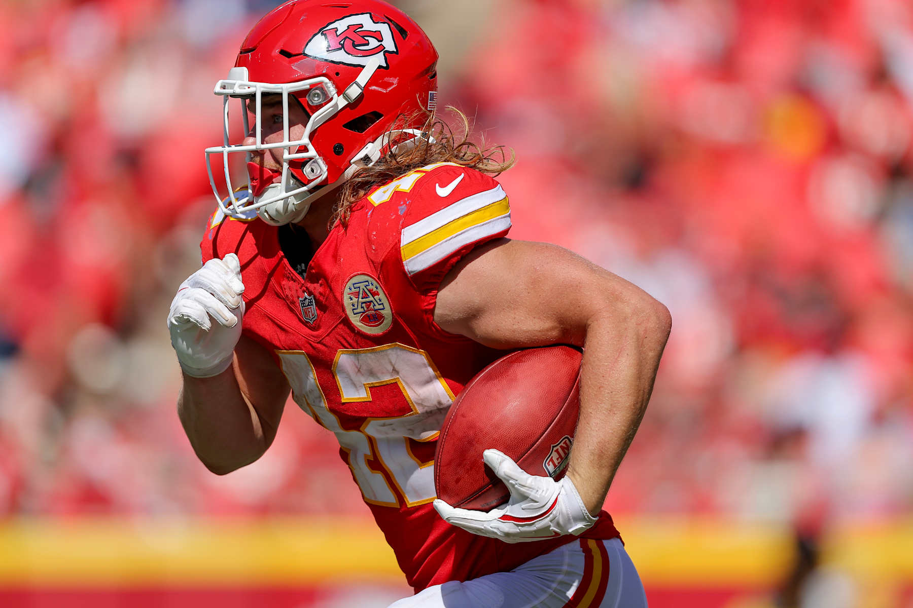KANSAS CITY, MISSOURI - AUGUST 17: Carson Steele #42 of the Kansas City Chiefs returns a second quarter kickoff during a preseason game against the Detroit Lions at GEHA Field at Arrowhead Stadium on August 17, 2024 in Kansas City, Missouri. (Photo by David Eulitt/Getty Images)