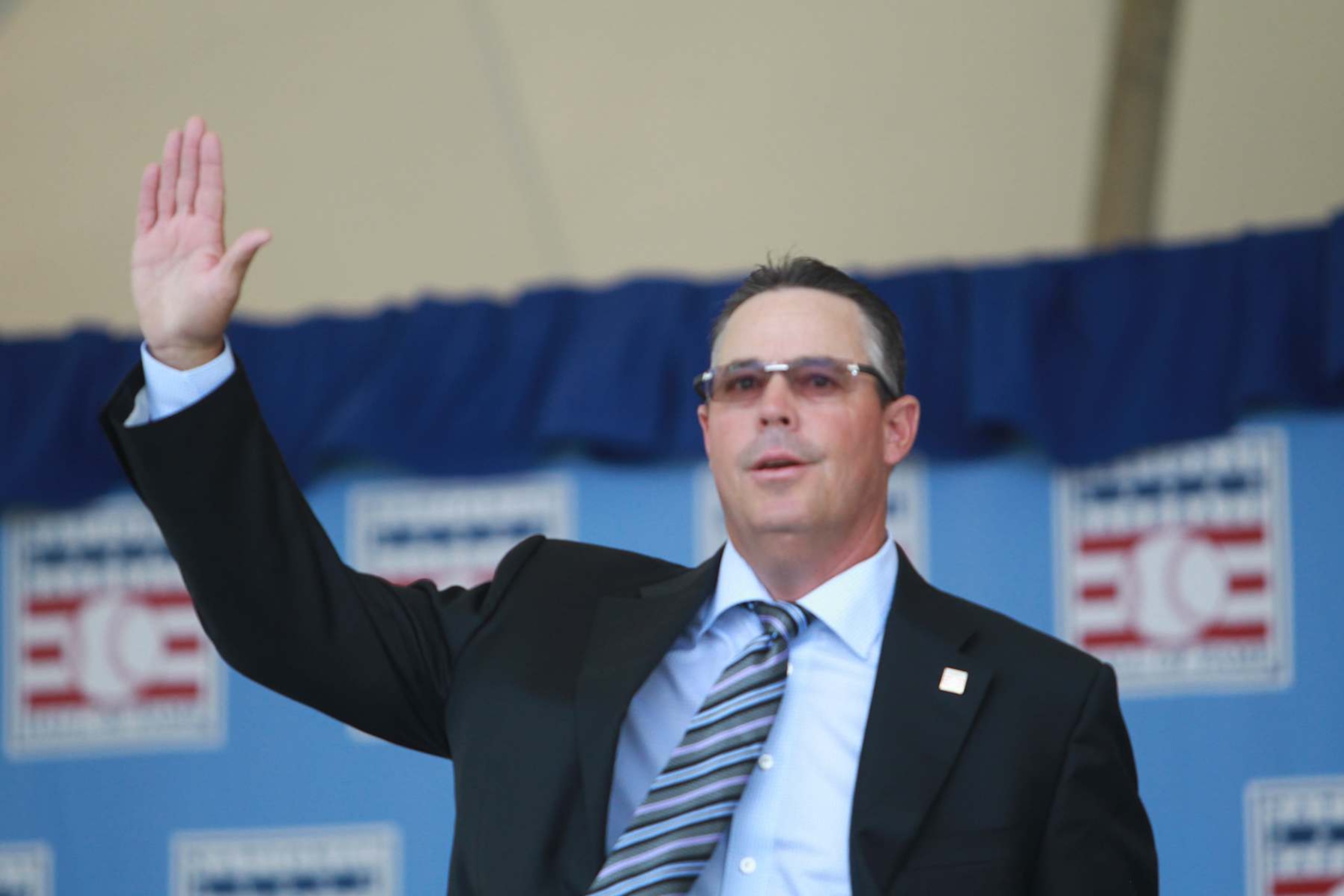 27 July 2014: Greg Maddux acknowledges the crowd during the class of 2014 National Baseball Hall of Fame induction ceremony at the Clark Sports Center in Cooperstown, New York. (Photo by Jerome Davis/Icon SMI/Corbis/Icon Sportswire via Getty Images)