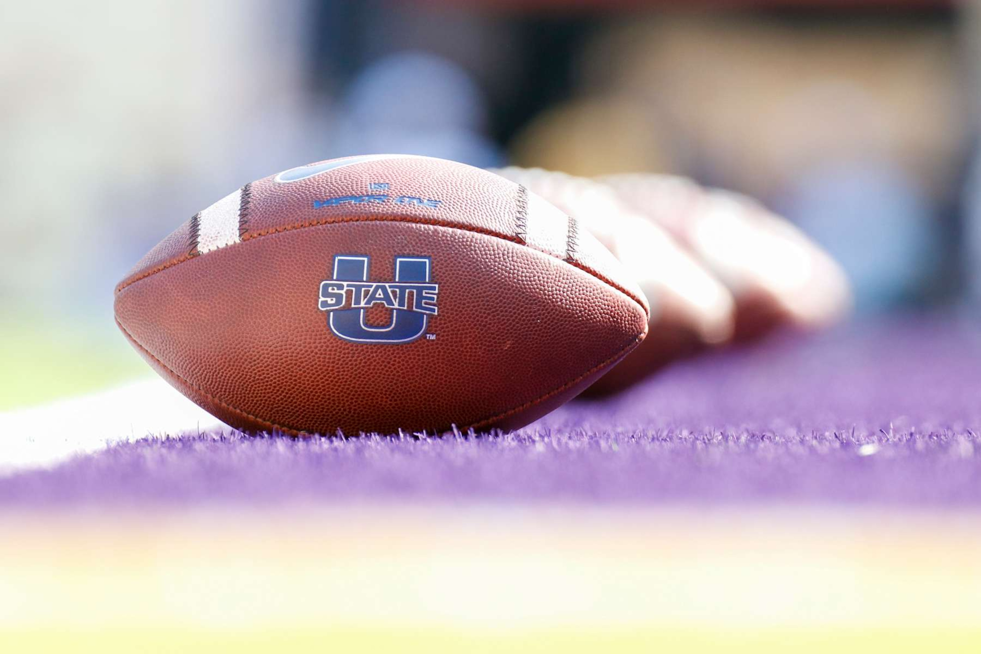 BATON ROUGE, LA - OCTOBER 05: Footballs with the Utah State Aggies logo before the game between the LSU Tigers and Utah State Aggies at LSU Tiger Stadium on October 5, 2019 in Baton Rouge, LA. (Photo by Andy Altenburger/Icon Sportswire via Getty Images) BATON ROUGE, LA - OCTOBER 05: Footballs with the Utah State Aggies logo before the game between the LSU Tigers and Utah State Aggies at LSU Tiger Stadium on October 5, 2019 in Baton Rouge, LA. (Photo by Andy Altenburger/Icon Sportswire via Getty Images)