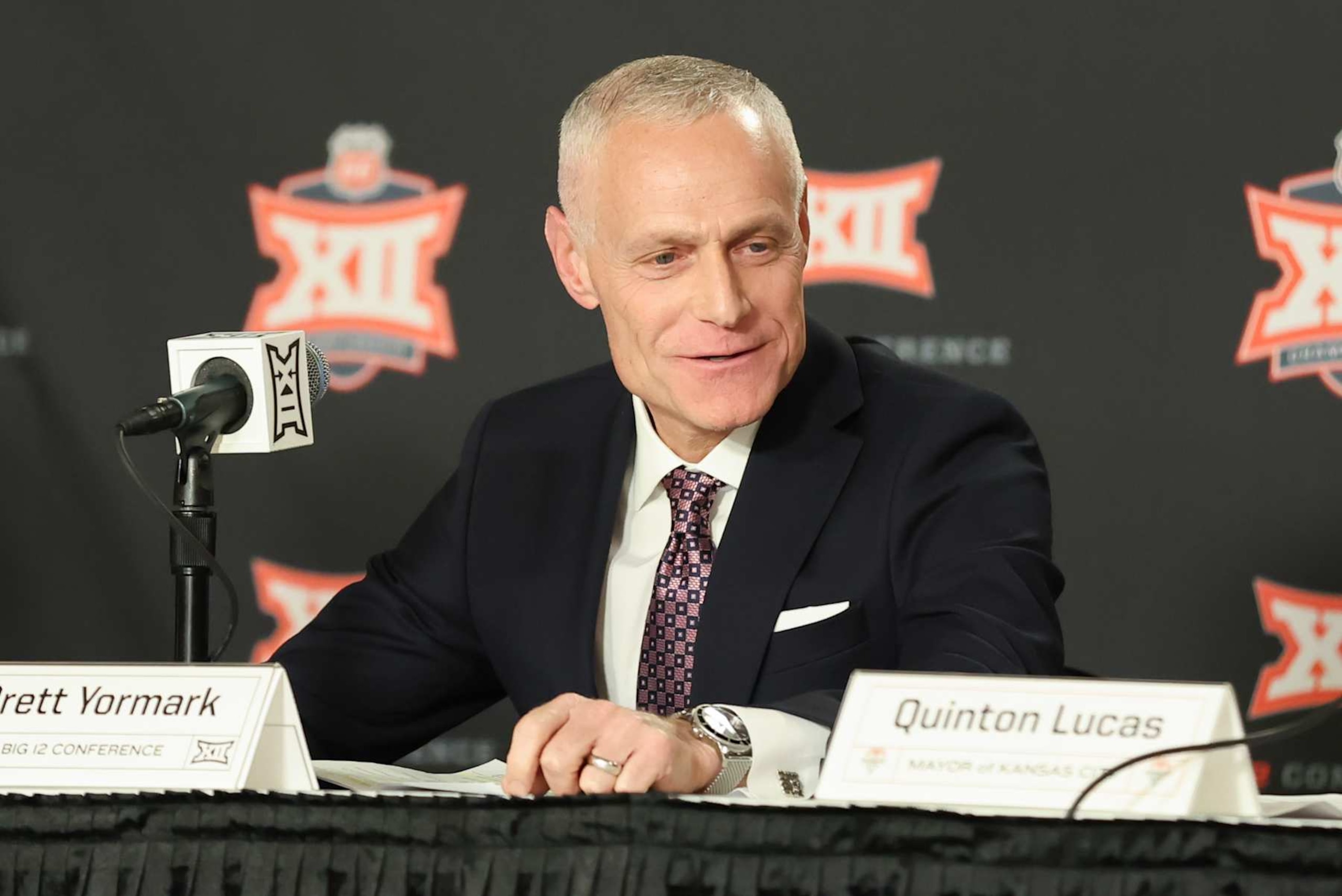 KANSAS CITY, MO - MARCH 12: Big 12 Commissioner Brett Yormark speaks at a press conference before the women's Big 12 tournament final between the Iowa State Cyclones and Texas Longhorns on Mar 12, 2024 at T-Mobile Center in Kansas City, MO. (Photo by Scott Winters/Icon Sportswire via Getty Images) KANSAS CITY, MO - MARCH 12: Big 12 Commissioner Brett Yormark speaks at a press conference before the women's Big 12 tournament final between the Iowa State Cyclones and Texas Longhorns on Mar 12, 2024 at T-Mobile Center in Kansas City, MO. (Photo by Scott Winters/Icon Sportswire via Getty Images)