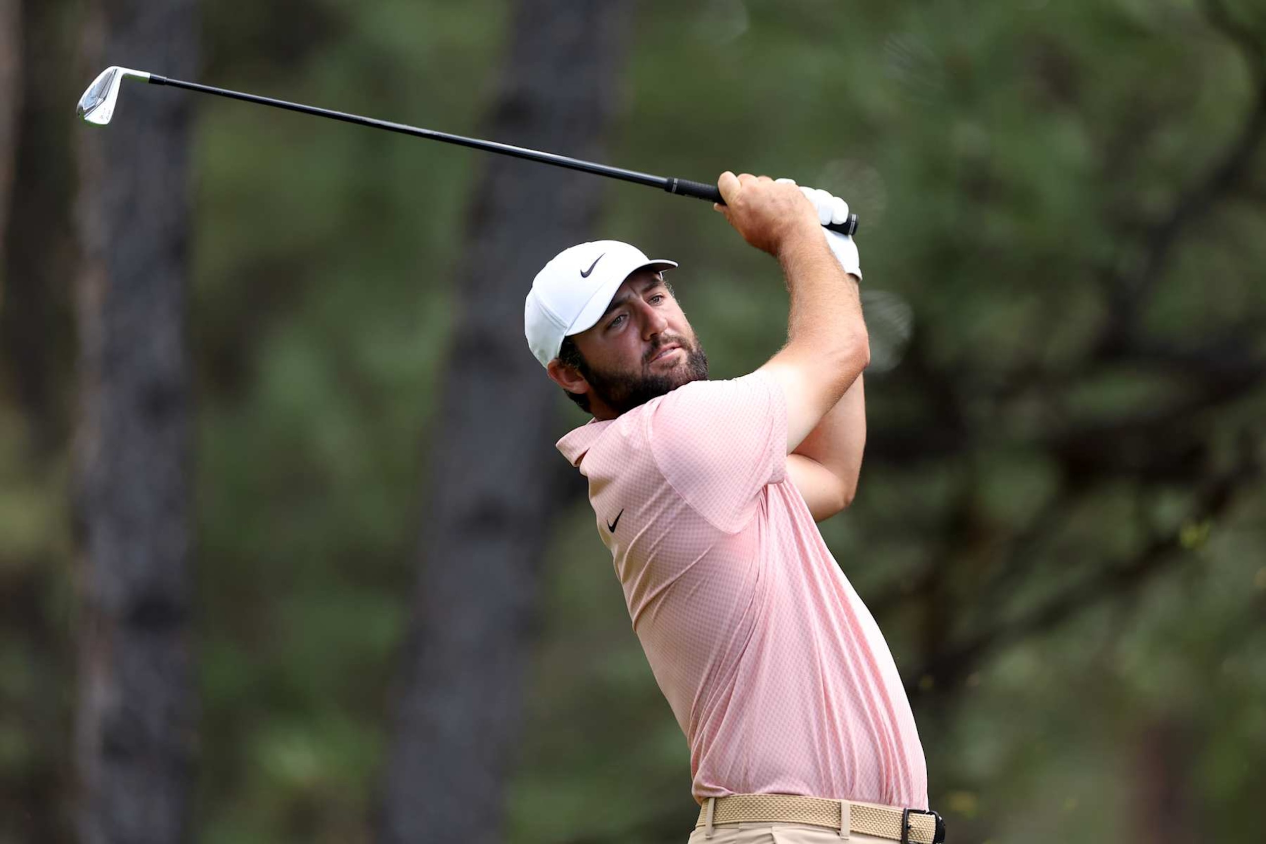 CASTLE ROCK, COLORADO - AUGUST 23: Scottie Scheffler of the United States plays his shot from the 12th tee during the second round of the BMW Championship at Castle Pines Golf Club on August 23, 2024 in Castle Rock, Colorado. (Photo by Christian Petersen/Getty Images)