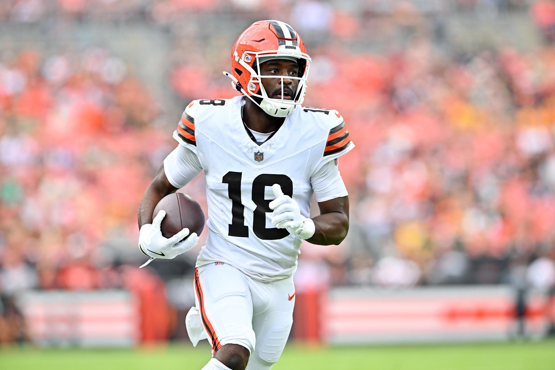 CLEVELAND, OHIO - AUGUST 10: Wide receiver David Bell #18 of the Cleveland Browns runs with the ball during the first half of a preseason game against the Green Bay Packers at Cleveland Browns Stadium on August 10, 2024, in Cleveland, Ohio. (Photo by Jason Miller/Getty Images)