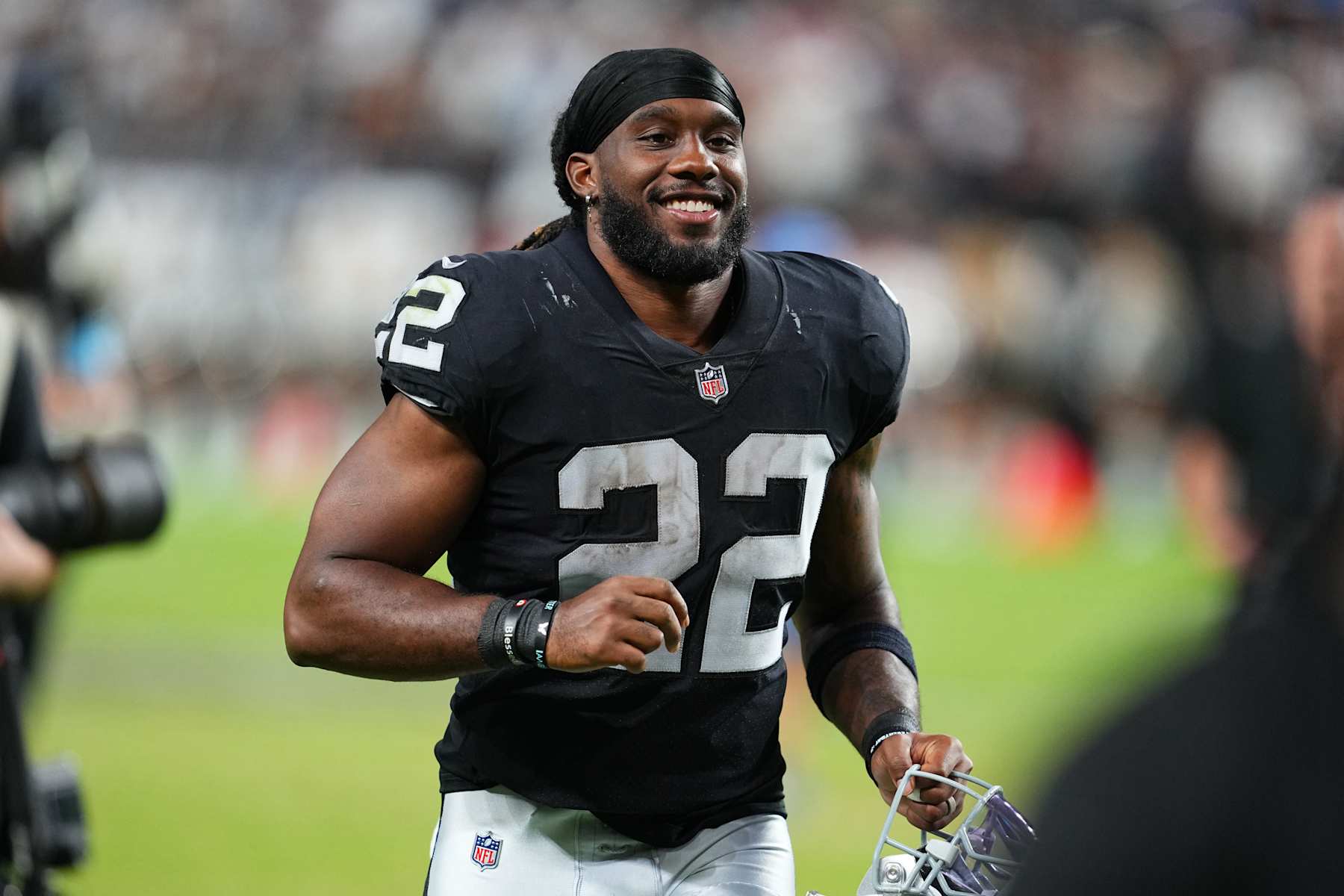 LAS VEGAS, NEVADA - AUGUST 17:  Running back Alexander Mattison #22 of the Las Vegas Raiders runs off the field after a preseason game against the Dallas Cowboys at Allegiant Stadium on August 17, 2024 in Las Vegas, Nevada.  (Photo by Chris Unger/Getty Images)