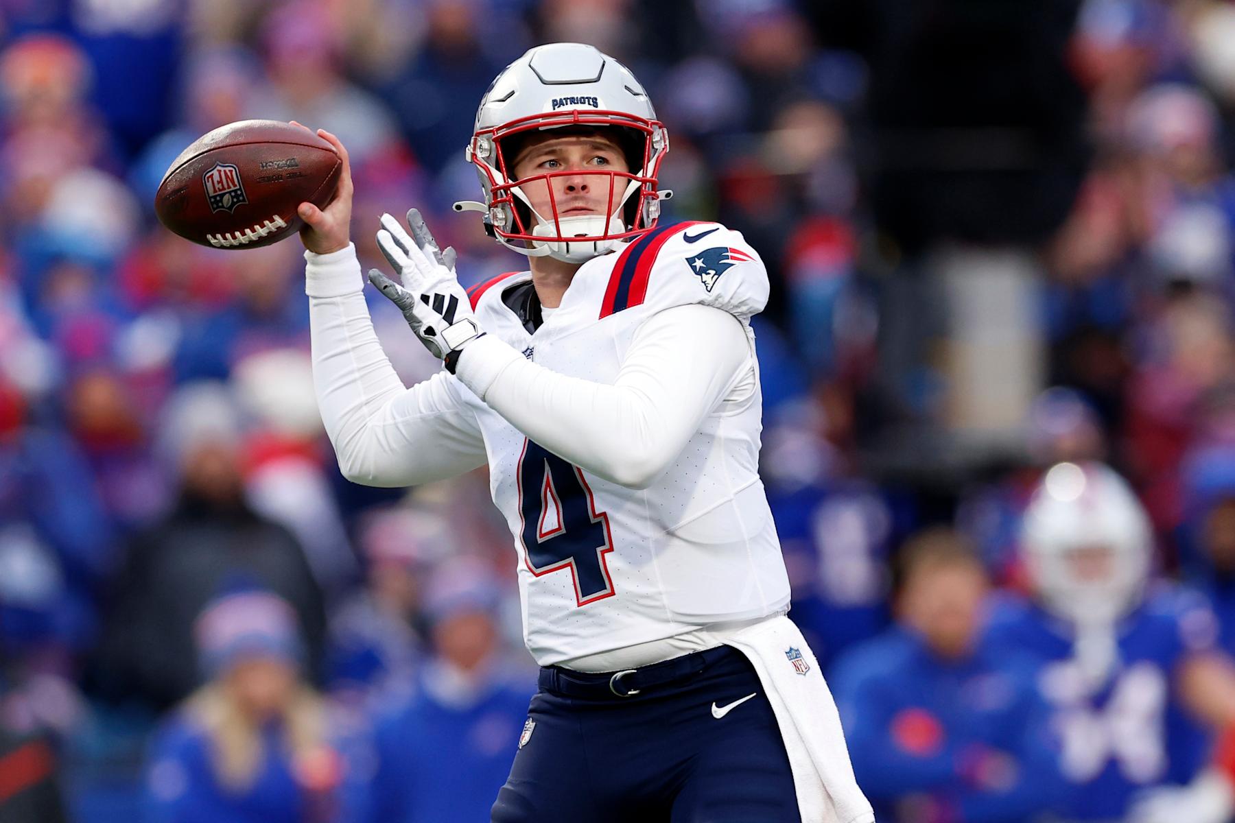 Orchard Park, NY - December 31: New England Patriots QB Bailey Zappe throws a pass in the first half. The Patriots lost to the Buffalo Bills, 27-21. (Photo by Danielle Parhizkaran/The Boston Globe via Getty Images)