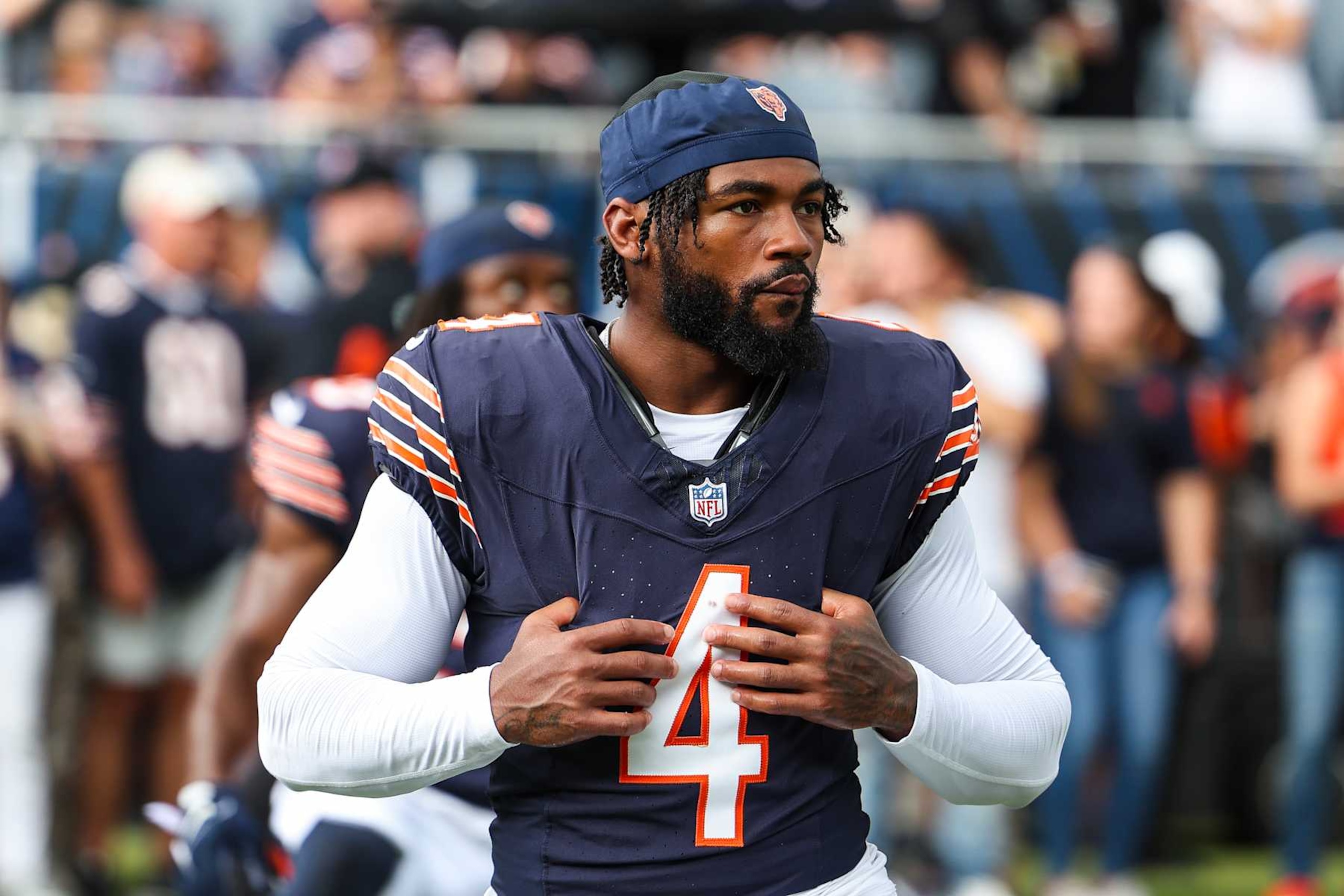 CHICAGO, IL - AUGUST 17: D'Andre Swift #4 of the Chicago Bears warms up prior to an NFL football game against the Cincinnati Bengals at Solider Field on August 17, 2024 in Chicago, Illinois. (Photo by Perry Knotts/Getty Images)