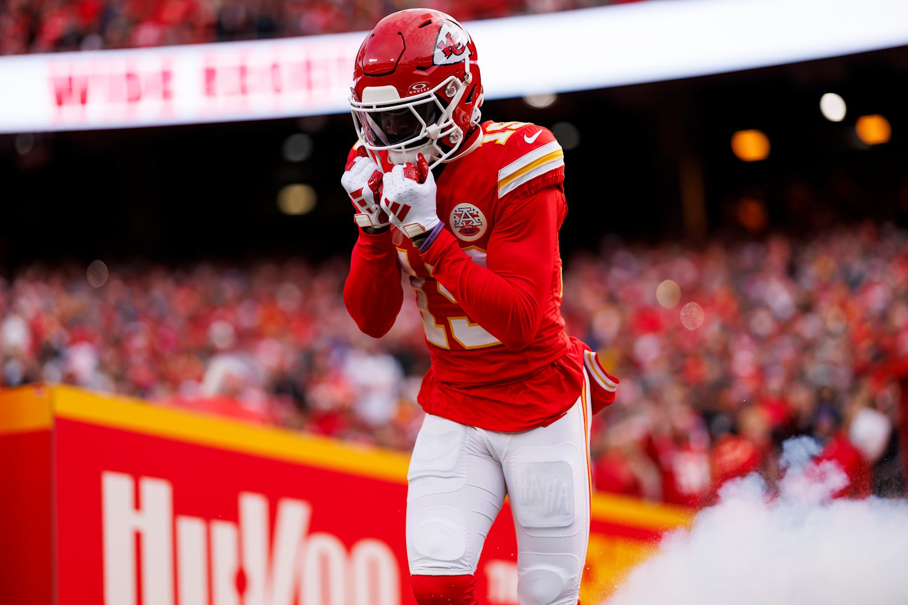 KANSAS CITY, MISSOURI - DECEMBER 10: Kadarius Toney #19 of the Kansas City Chiefs celebrates as he runs onto the field during player introductions before an NFL football game against the Buffalo Bills at GEHA Field at Arrowhead Stadium on December 10, 2023 in Kansas City, Missouri. (Photo by Ryan Kang/Getty Images)