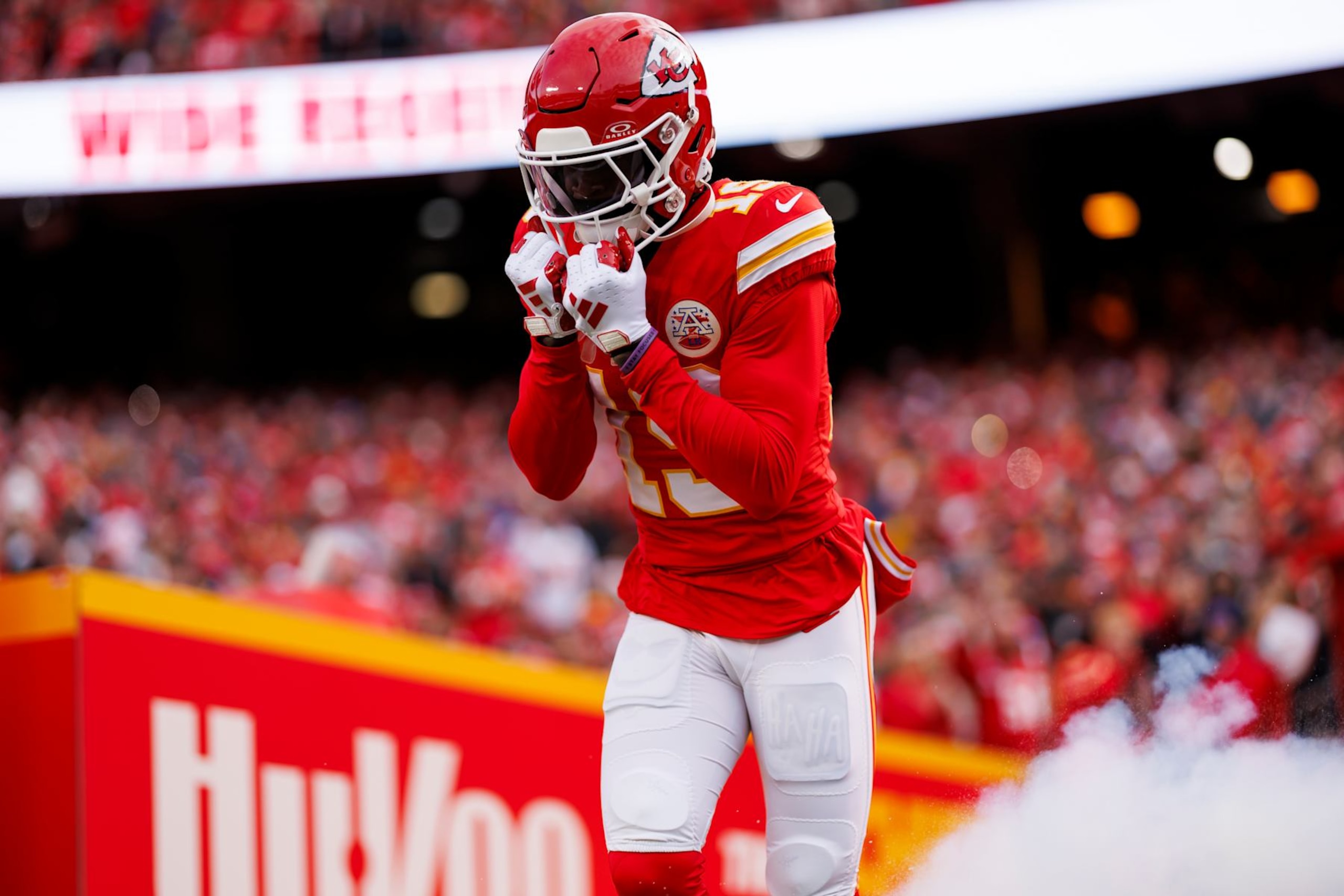KANSAS CITY, MISSOURI - DECEMBER 10: Kadarius Toney #19 of the Kansas City Chiefs celebrates as he runs onto the field during player introductions before an NFL football game against the Buffalo Bills at GEHA Field at Arrowhead Stadium on December 10, 2023 in Kansas City, Missouri. (Photo by Ryan Kang/Getty Images)