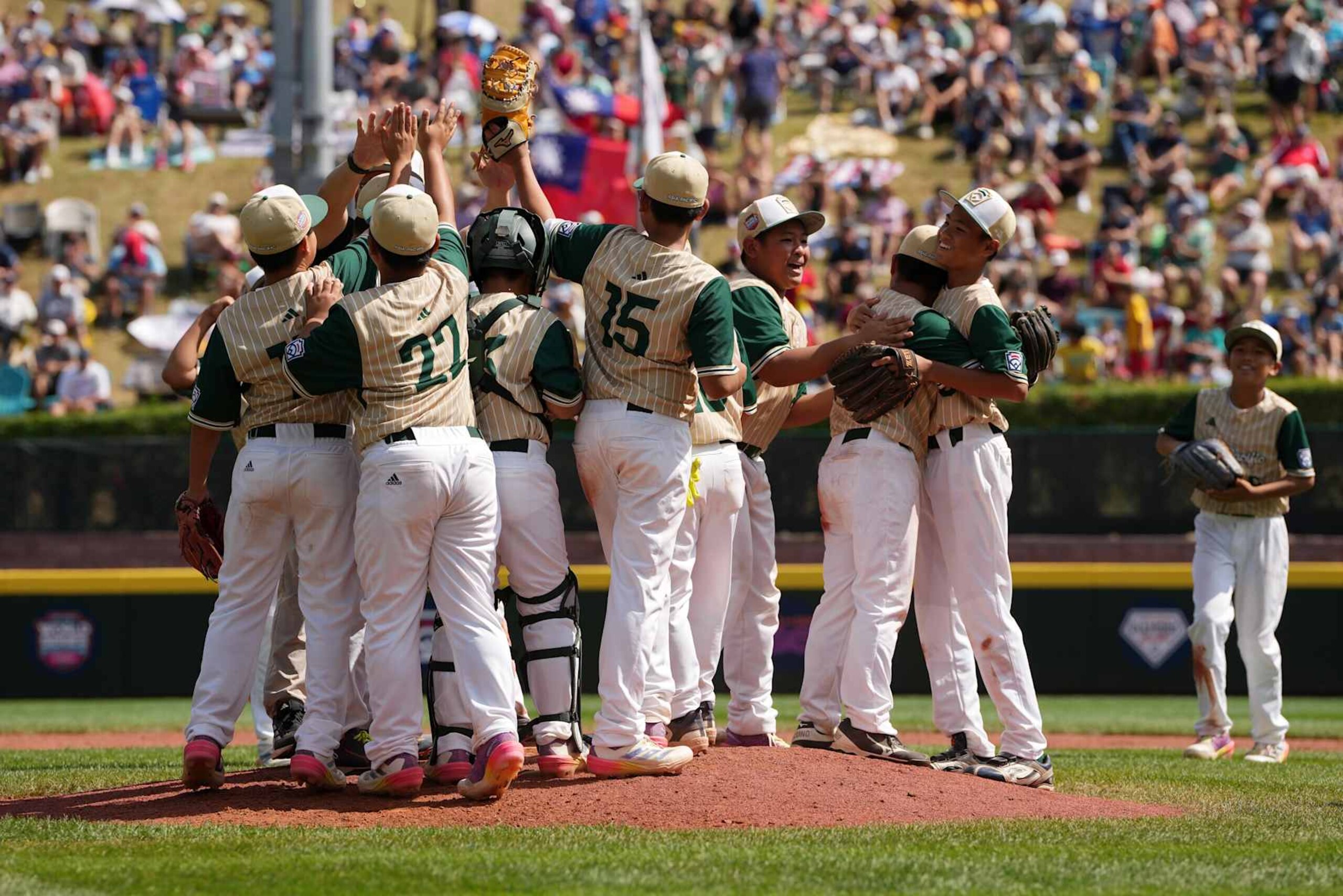 SOUTH WILLIAMSPORT, PENNSYLVANIA - AUGUST 24: The Asia-Pacific Region team from Taoyuan Ciy, Chinese Taipei celebrates after defeating the Latin America Region team from Barquisimeto, Venezuela 4-1 to win the International Championship game at the Little League World Series at Lamade Stadium on August 24, 2024 in South Williamsport, Pennsylvania. (Photo by Dylan Buell/Getty Images)