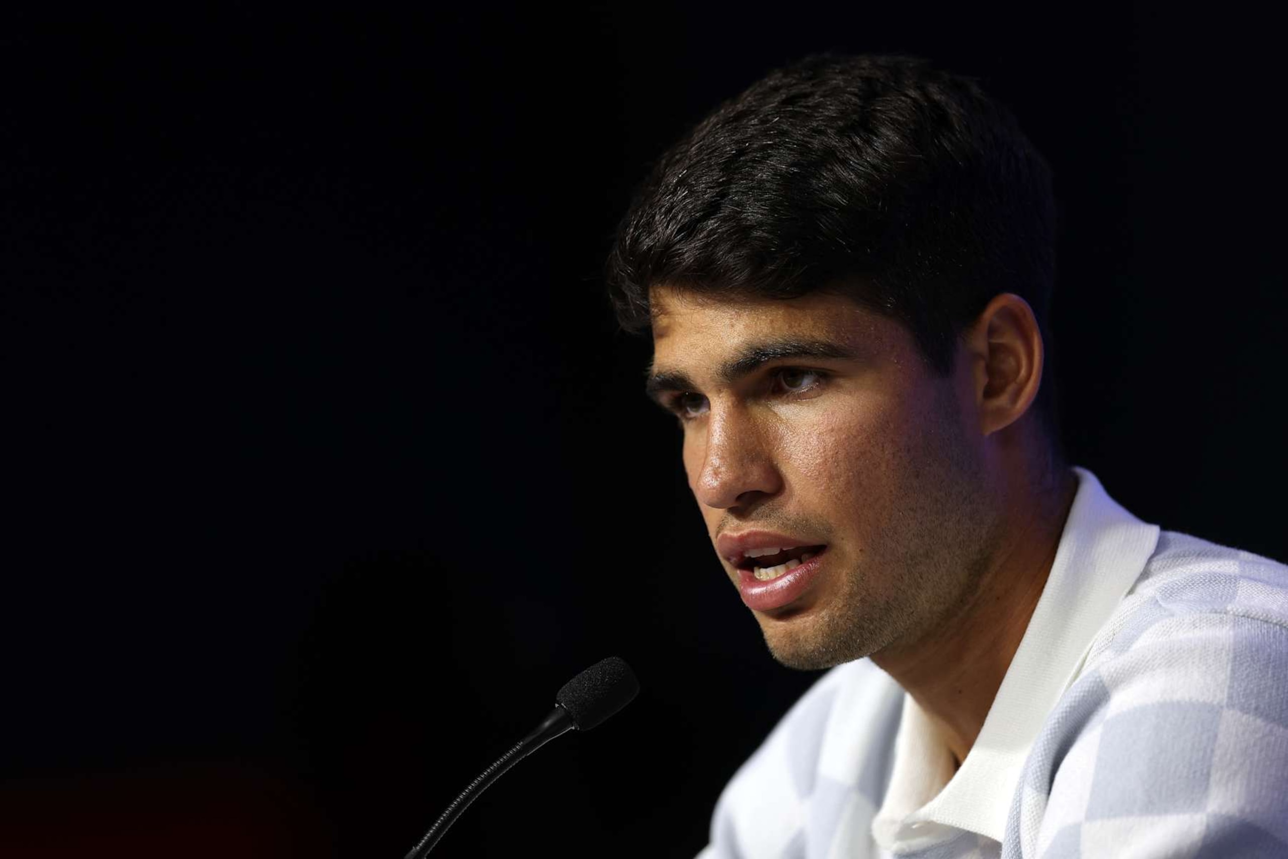 NEW YORK, NEW YORK - AUGUST 24:  Carlos Alcaraz of Spain speaks to the media ahead of the US Open at USTA Billie Jean King National Tennis Center on August 24, 2024 in New York City.  (Photo by Jamie Squire/Getty Images)