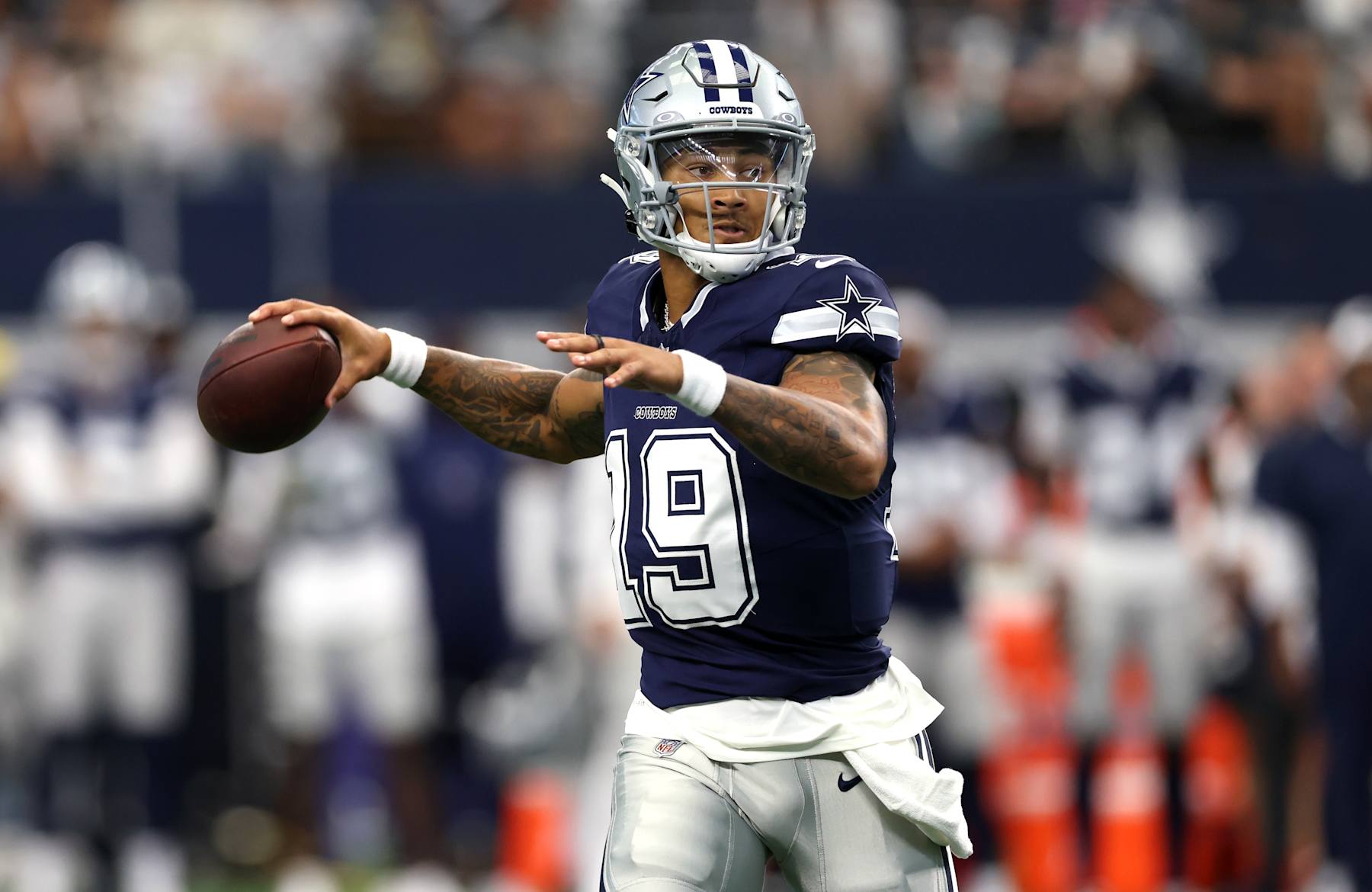 ARLINGTON, TX - AUGUST 24: Trey Lance #19 of the Dallas Cowboys looks to throw against the Los Angeles Chargers during the first half of a preseason game at AT&T Stadium on August 24, 2024 in Arlington, Texas. (Photo by Ron Jenkins/Getty Images)