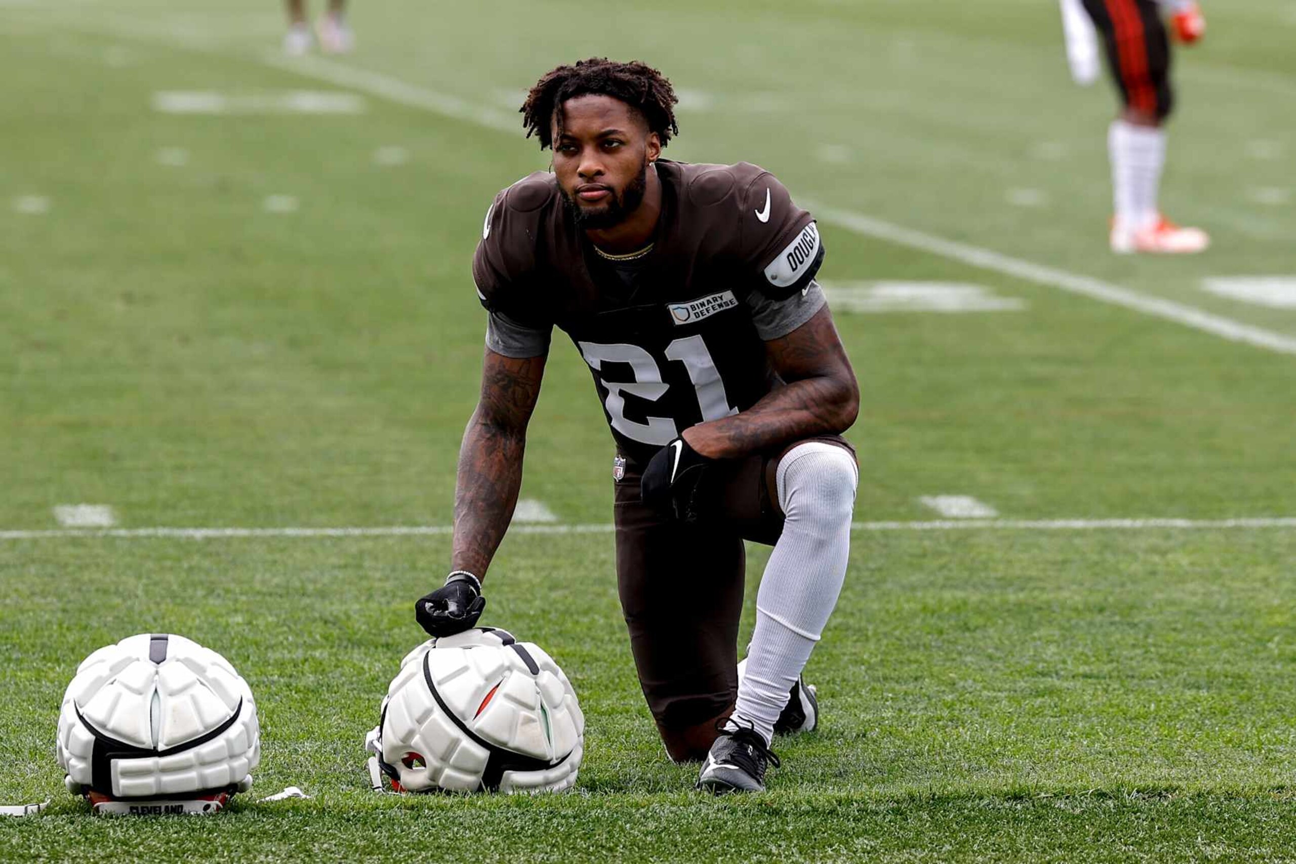 BEREA, OH - AUGUST 05: Cornerback Denzel Ward #21 of the Cleveland Browns takes a  break during Training Camp at their CrossCountry Mortgage Campus on August 5, 2024 in Berea, Ohio. (Photo by Don Juan Moore/Getty Images)