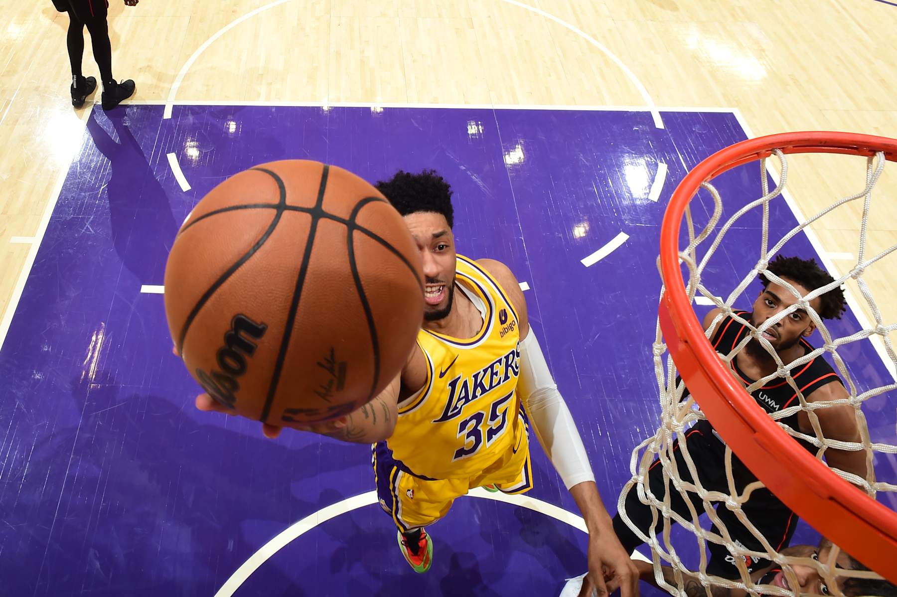 LOS ANGELES, CA - February 13: Christian Wood #35 of the Los Angeles Lakers drives to the basket during the game against the Detroit Pistons on February 13, 2024 at Crypto.Com Arena in Los Angeles, California. NOTE TO USER: User expressly acknowledges and agrees that, by downloading and/or using this Photograph, user is consenting to the terms and conditions of the Getty Images License Agreement. Mandatory Copyright Notice: Copyright 2024 NBAE (Photo by Adam Pantozzi/NBAE via Getty Images)