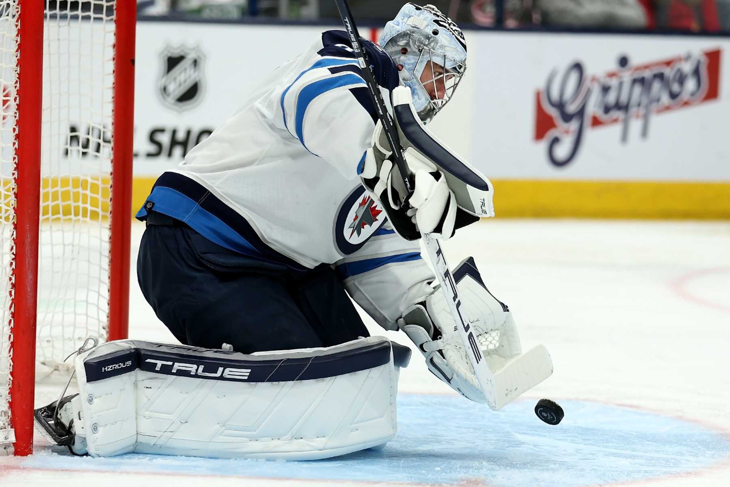 COLUMBUS, OHIO - MARCH 17:  Connor Hellebuyck #37 of the Winnipeg Jets makes a save during the game against the Columbus Blue Jackets at Nationwide Arena on March 17, 2024 in Columbus, Ohio. (Photo by Kirk Irwin/Getty Images)