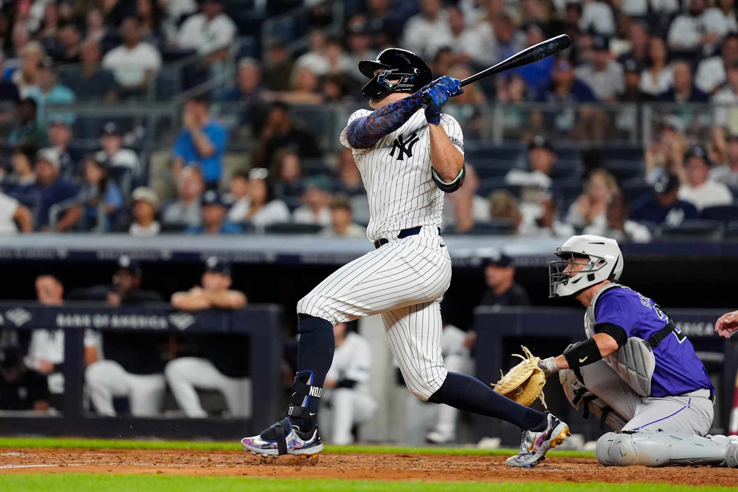BRONX, NY - AUGUST 23: New York Yankees Designated Hitter Giancarlo Stanton (27) hits a home run during the fourth inning of the Major League Baseball game between the Colorado Rockies and the New York Yankees on August 23,2024, at Yankee Stadium in the Bronx, NY. (Photo by Gregory Fisher/Icon Sportswire via Getty Images) BRONX, NY - AUGUST 23: New York Yankees Designated Hitter Giancarlo Stanton (27) hits a home run during the fourth inning of the Major League Baseball game between the Colorado Rockies and the New York Yankees on August 23,2024, at Yankee Stadium in the Bronx, NY. (Photo by Gregory Fisher/Icon Sportswire via Getty Images)