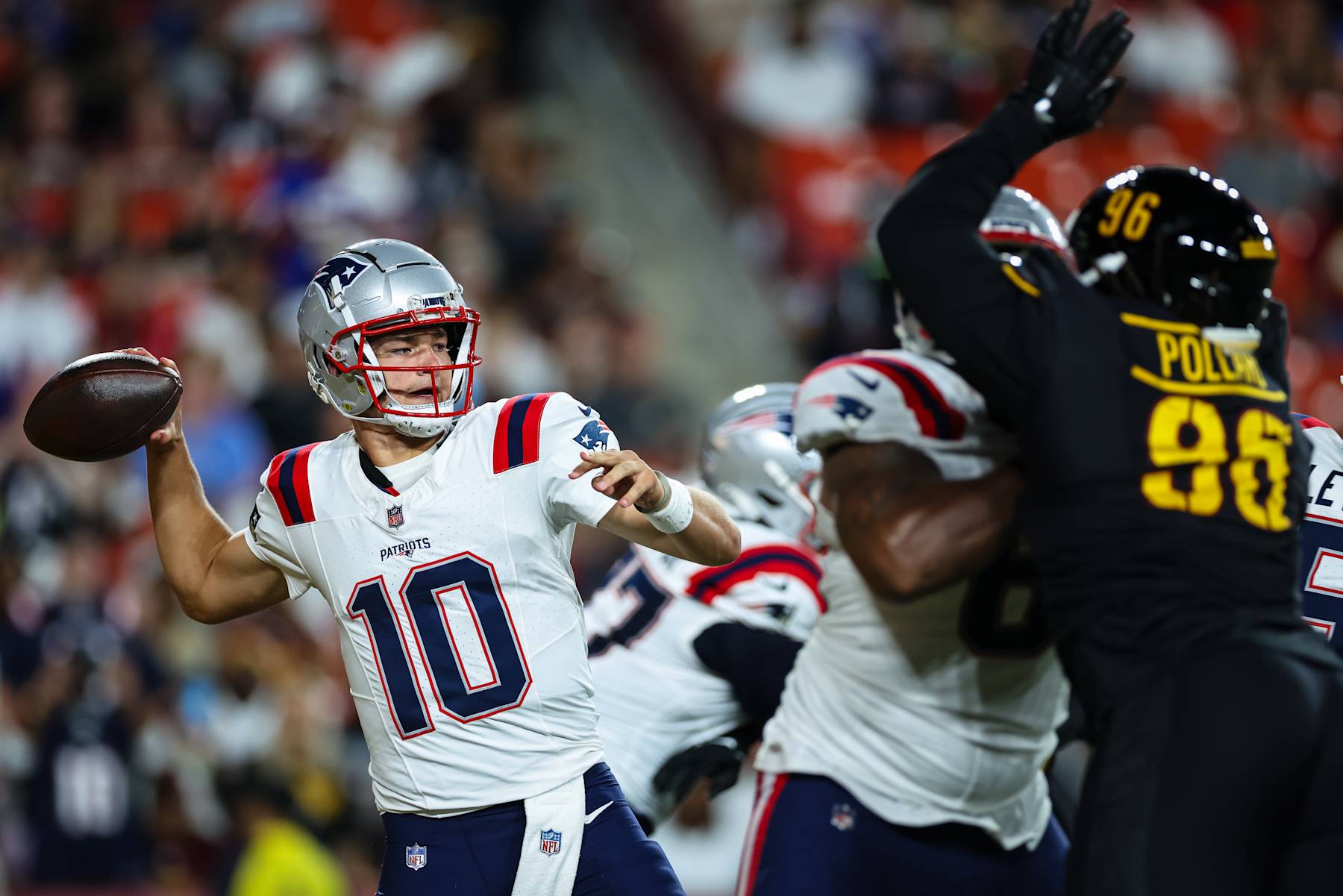 LANDOVER, MD - AUGUST 25: Drake Maye #10 of the New England Patriots passes against the Washington Commanders in the first quarter of a preseason game at Commanders Field on August 25, 2024 in Landover, Maryland. (Photo by Scott Taetsch/Getty Images) LANDOVER, MD - AUGUST 25: Drake Maye #10 of the New England Patriots passes against the Washington Commanders in the first quarter of a preseason game at Commanders Field on August 25, 2024 in Landover, Maryland. (Photo by Scott Taetsch/Getty Images)