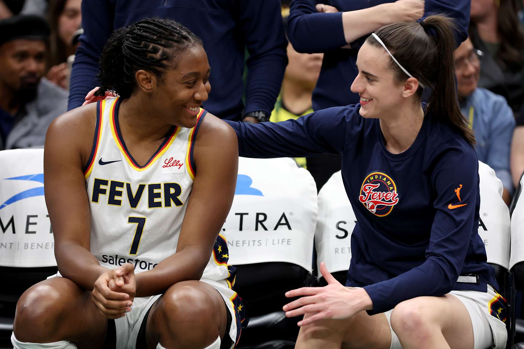 SEATTLE, WASHINGTON - JUNE 27: Aliyah Boston #7 and Caitlin Clark #22 of the Indiana Fever sit on the bench before the game against the Seattle Storm at Climate Pledge Arena on June 27, 2024 in Seattle, Washington. NOTE TO USER: User expressly acknowledges and agrees that, by downloading and or using this photograph, User is consenting to the terms and conditions of the Getty Images License Agreement. (Photo by Steph Chambers/Getty Images)