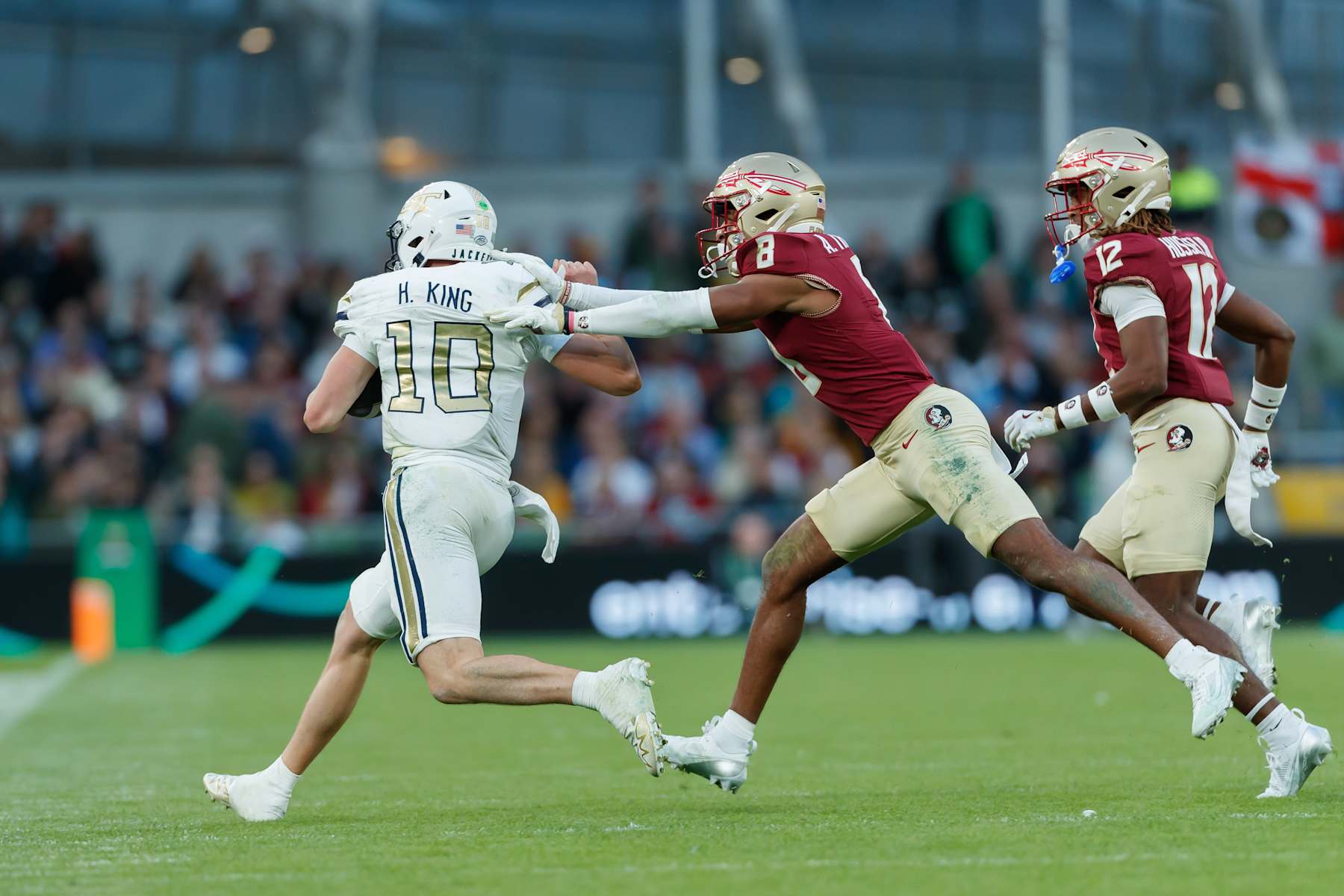Dublin, Ireland - August 24: Haynes King of Georgia Tech Yellow Jackets and Azareye'h Thomas of Florida State Seminoles battle for the ball during the 2024 Aer Lingus College Football Classic match between Florida State and Georgia Tech at Aviva Stadium on August 24, 2024 in Dublin, Ireland. (Photo by Mario Hommes/DeFodi Images via Getty Images)