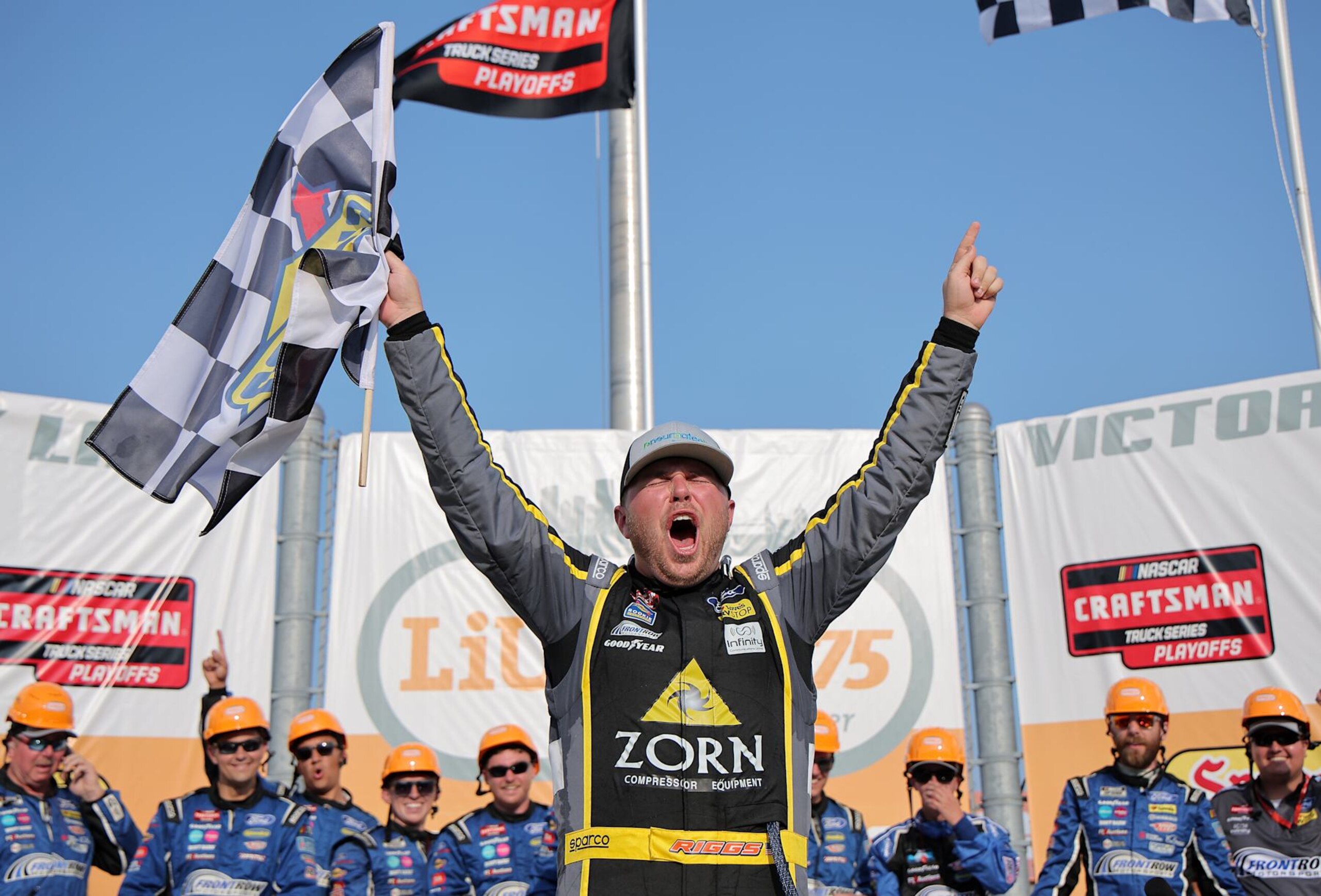 WEST ALLIS, WISCONSIN - AUGUST 25: Layne Riggs, driver of the #38 Zorn Compressor & Equipment Ford, celebrates in victory lane after winning the NASCAR Craftsman Truck Series The Milwaukee Mile at The Milwaukee Mile on August 25, 2024 in West Allis, Wisconsin. (Photo by Jonathan Bachman/Getty Images)