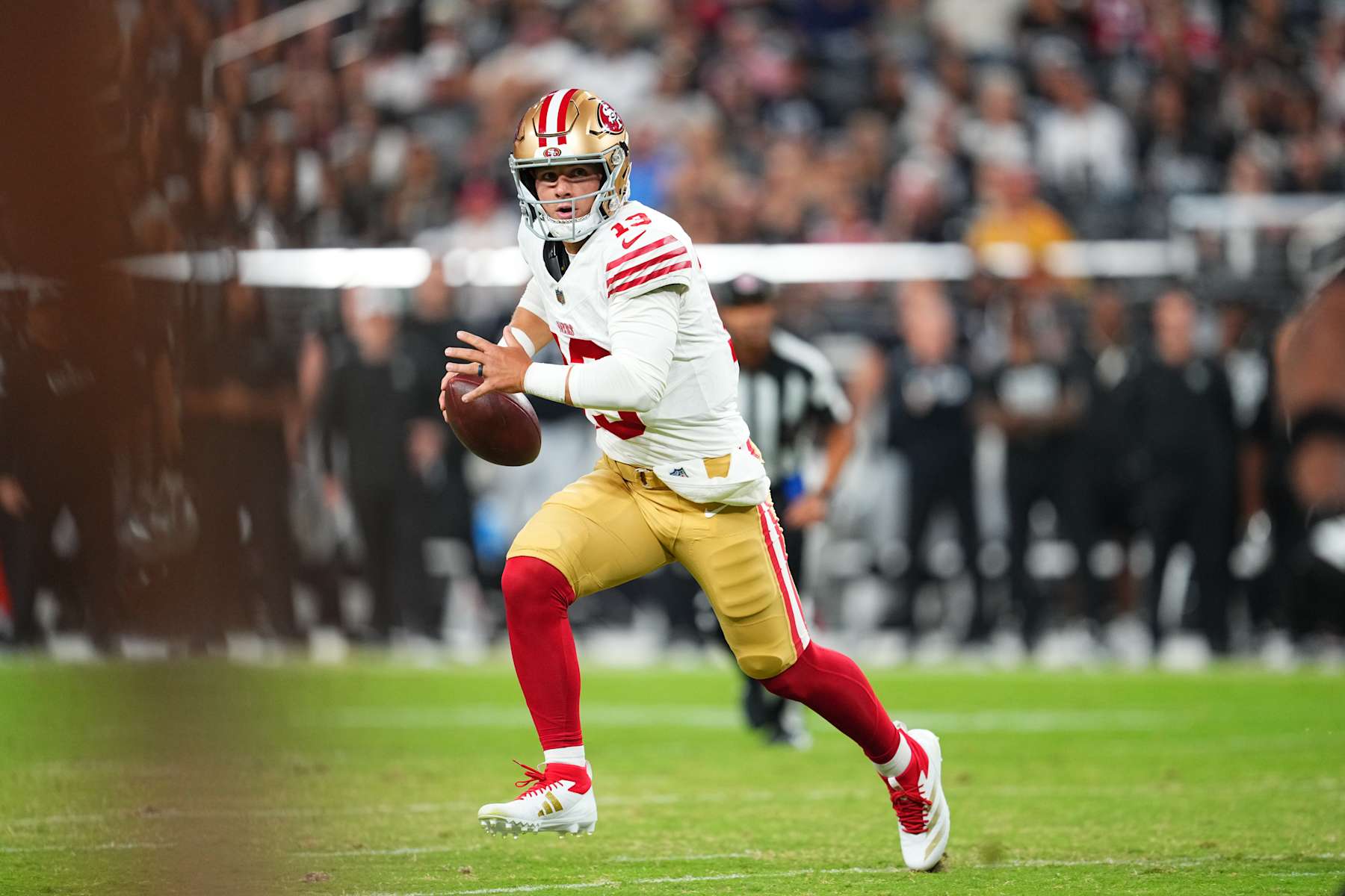 LAS VEGAS, NEVADA - AUGUST 23: Quarterback Brock Purdy #13 of the San Francisco 49ers looks to throw against the Las Vegas Raiders in the first half of a preseason game at Allegiant Stadium on August 23, 2024 in Las Vegas, Nevada. (Photo by Chris Unger/Getty Images)