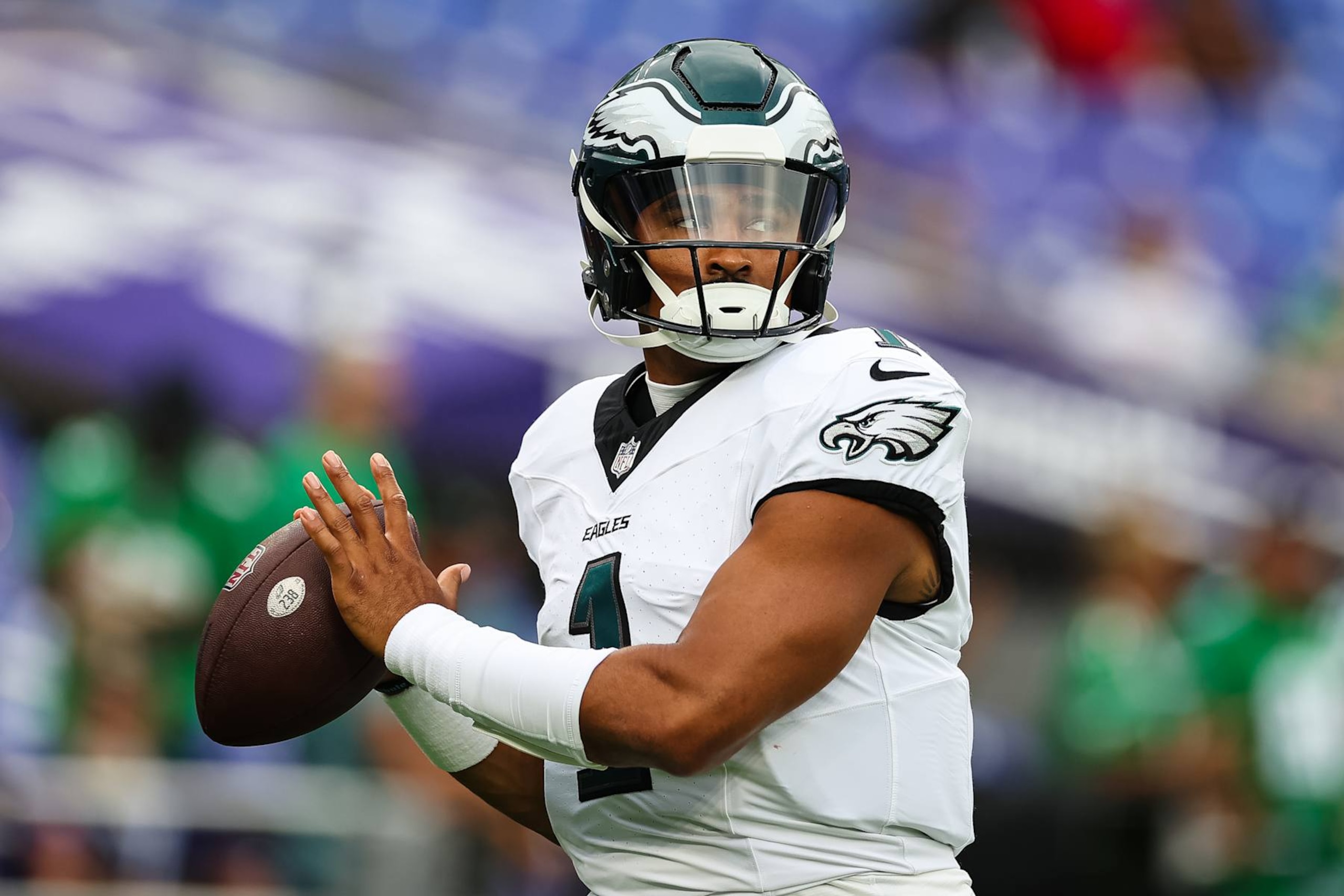 BALTIMORE, MD - AUGUST 09: Jalen Hurts #1 of the Philadelphia Eagles warms up before a preseason game against the Baltimore Ravens at M&T Bank Stadium on August 9, 2024 in Baltimore, Maryland. (Photo by Scott Taetsch/Getty Images)