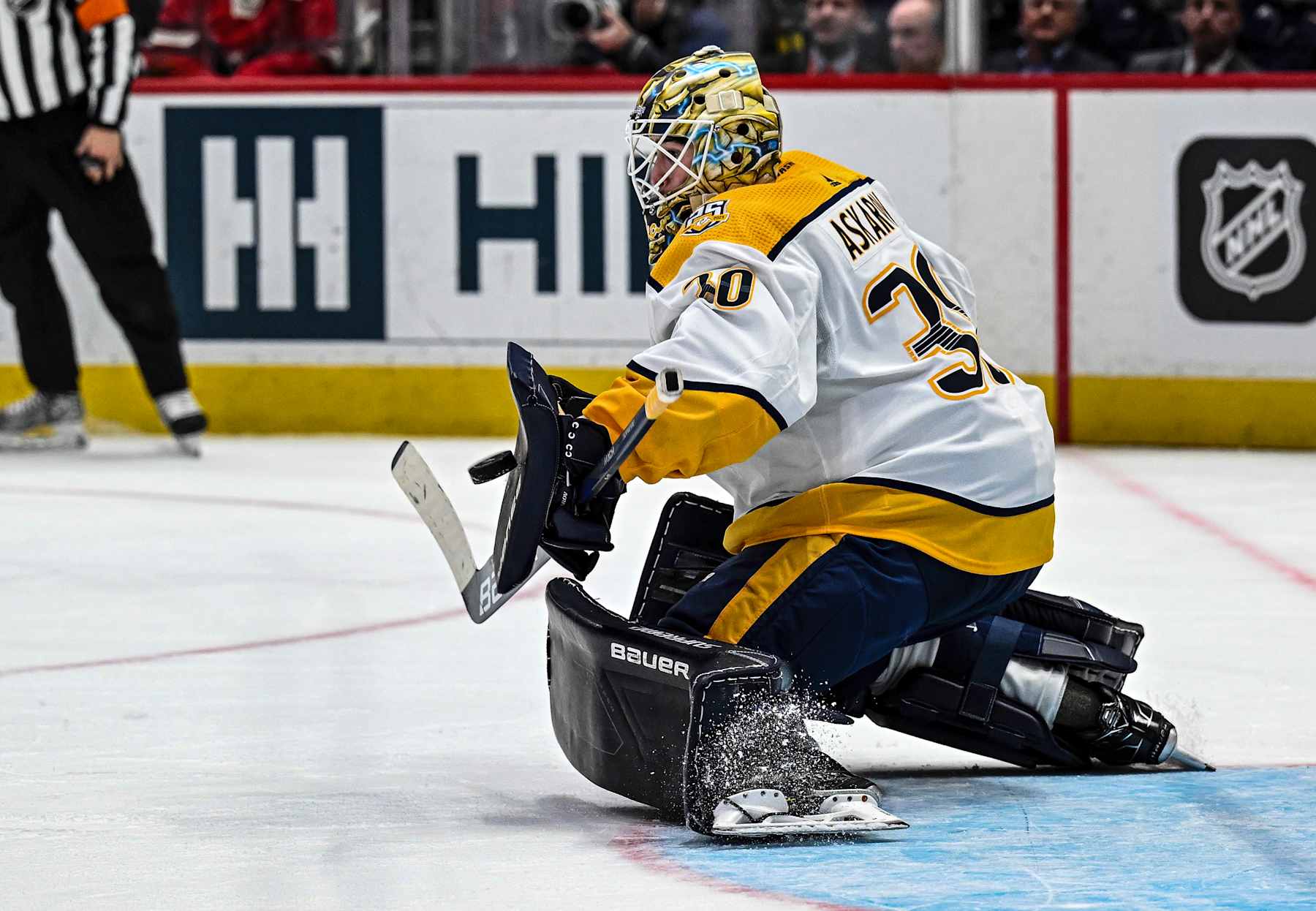 WASHINGTON, DC - DECEMBER 30: Nashville Predators goaltender Yaroslav Askarov (30) makes a save during the Nashville Predators game versus the Washington Capitals on December 30, 2023 at the Capital One Arena in Washington, D.C.  (Photo by Mark Goldman/Icon Sportswire via Getty Images)