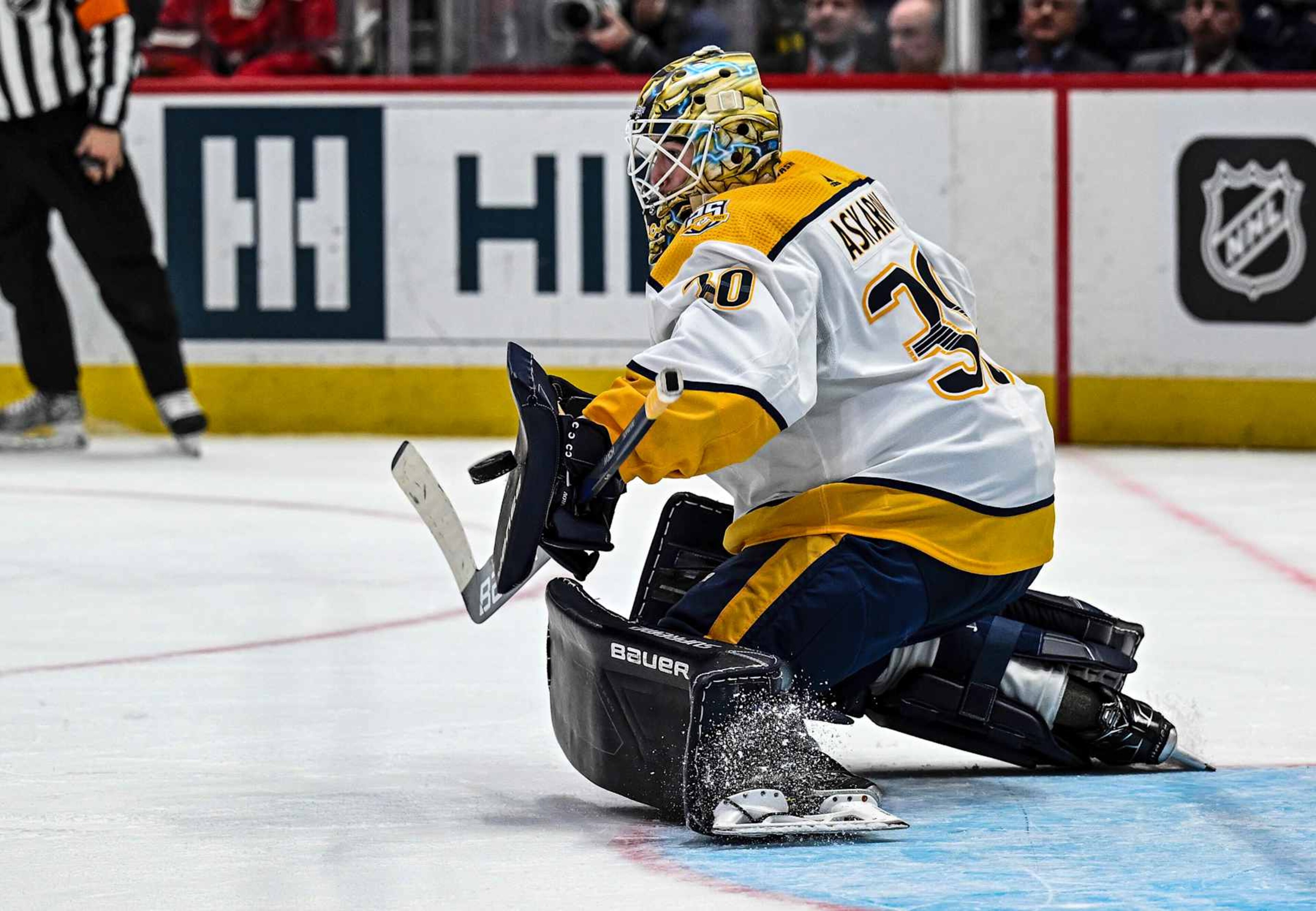 WASHINGTON, DC - DECEMBER 30: Nashville Predators goaltender Yaroslav Askarov (30) makes a save during the Nashville Predators game versus the Washington Capitals on December 30, 2023 at the Capital One Arena in Washington, D.C.  (Photo by Mark Goldman/Icon Sportswire via Getty Images)