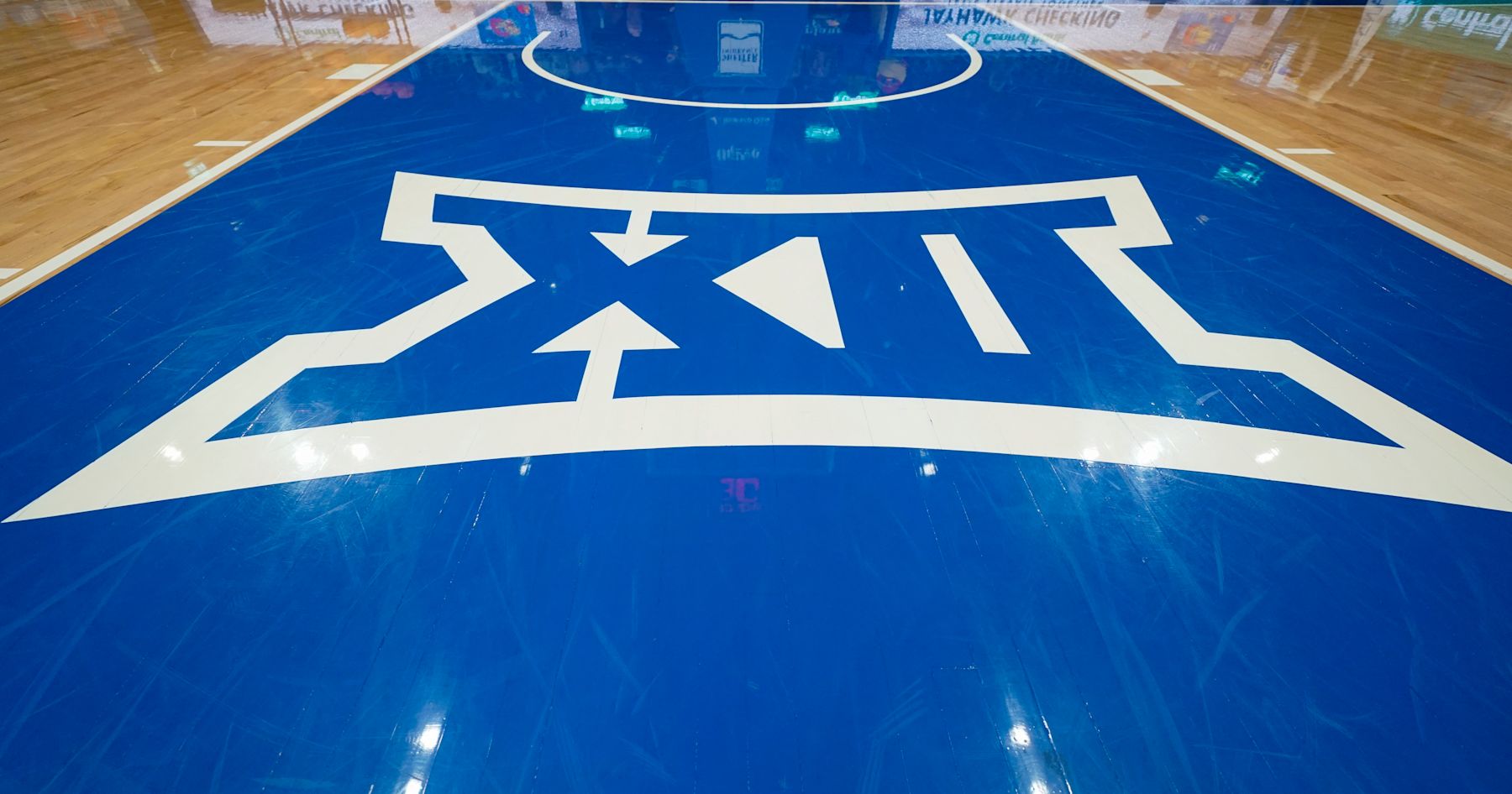 LAWRENCE, KS - DECEMBER 1:  The Big 12 Conference  logo before the Big East-Big 12 Battle game between the Kansas Jayhawks and the Connecticut Huskies on December 1, 2023 in Lawrence, Kansas. (Photo by Porter Binks/Getty Images).