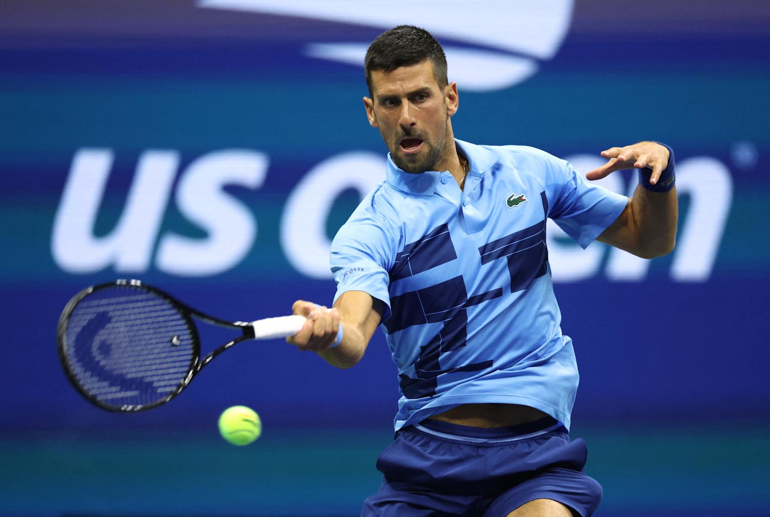 Serbia's Novak Djokovic returns the ball to Moldova's Radu Albot during their men's singles first round tennis match on day one of the US Open tennis tournament at the USTA Billie Jean King National Tennis Center in New York City, on August 26, 2024. (Photo by CHARLY TRIBALLEAU / AFP) (Photo by CHARLY TRIBALLEAU/AFP via Getty Images)