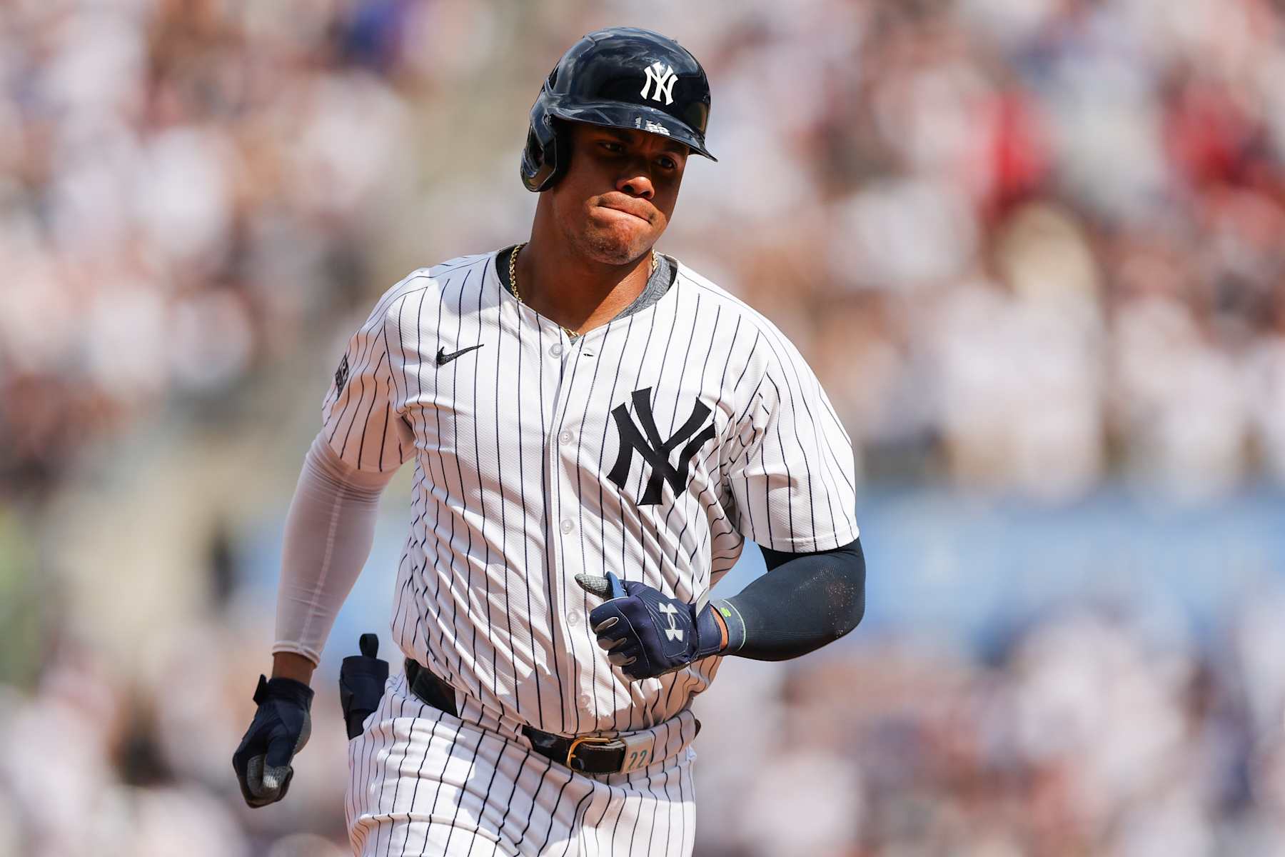 BRONX, NY - AUGUST 25: New York Yankees outfielder Juan Soto (22) hits a home run during a Major League Baseball game between the Colorado Rockies and New York Yankees on August 25, 2024 at Yankee Stadium in the Bronx, New York.