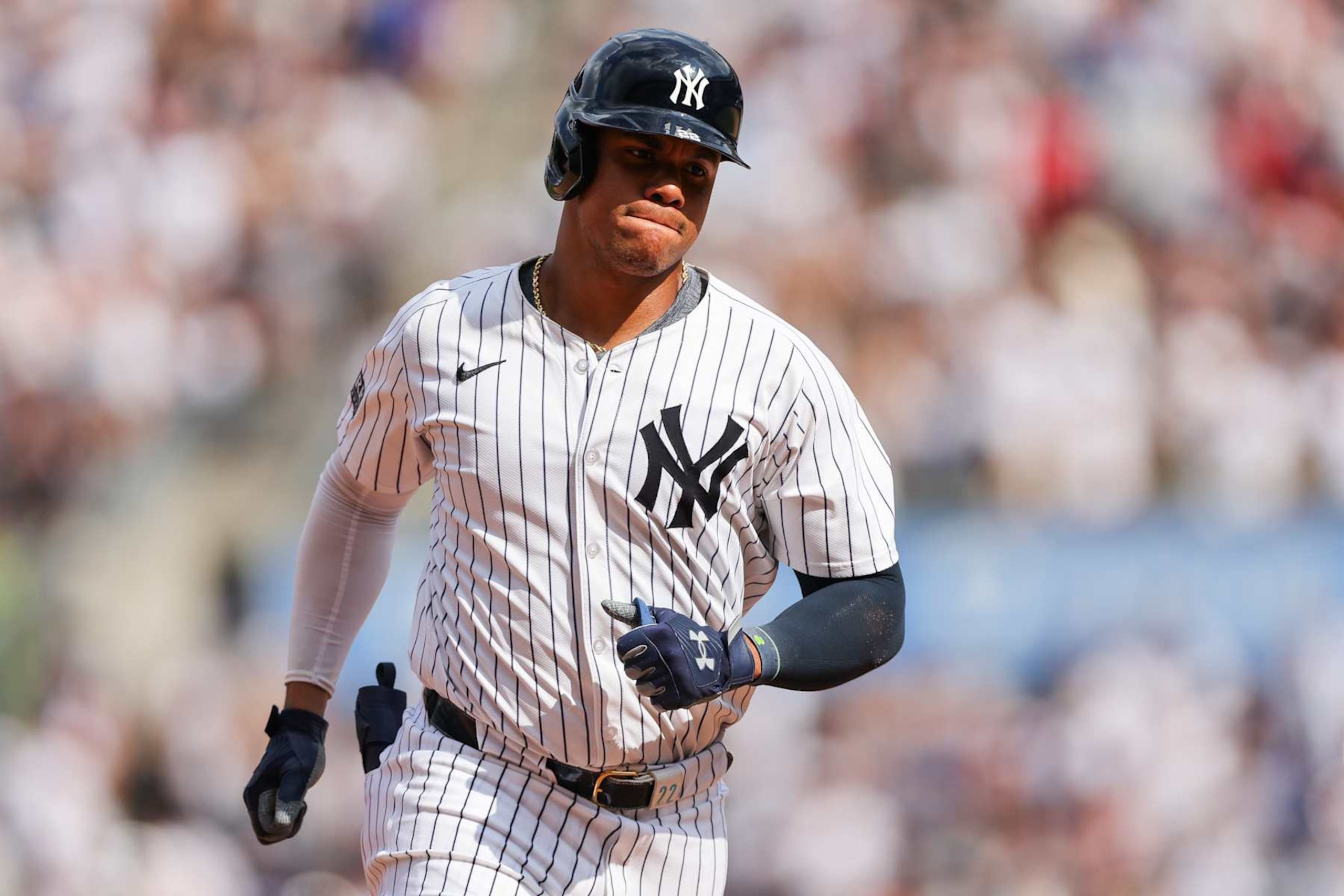 BRONX, NY - AUGUST 25: New York Yankees outfielder Juan Soto (22) hits a home run during a Major League Baseball game between the Colorado Rockies and New York Yankees on August 25, 2024 at Yankee Stadium in the Bronx, New York.