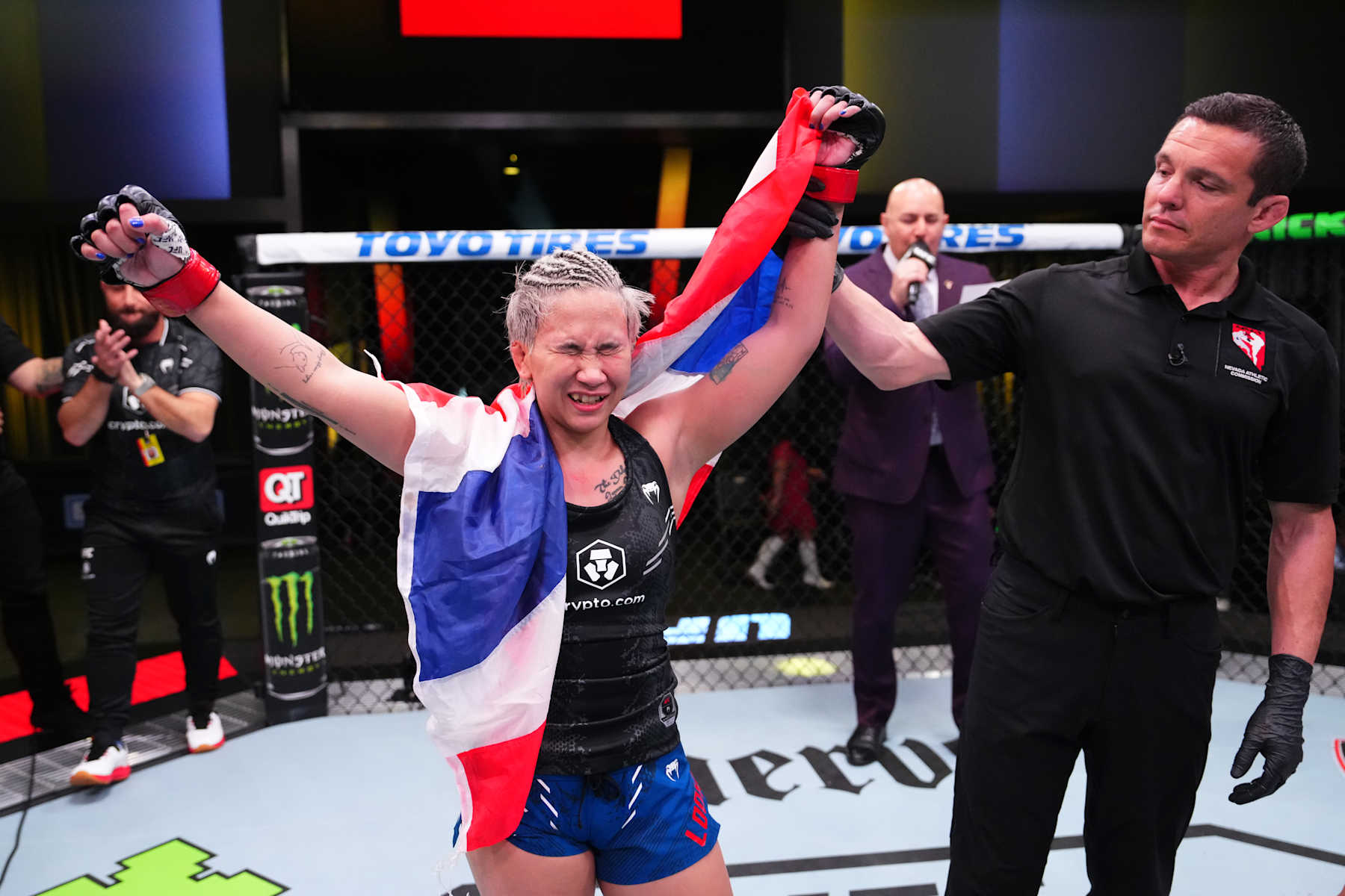 Loma Lookboonmee of Thailand reacts after her victory against Bruna Brasil in Feb. 2024.