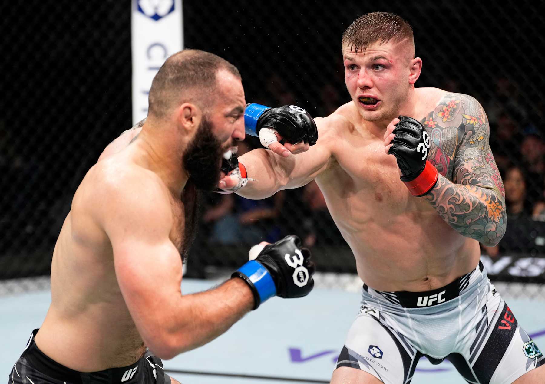 Marvin Vettori of Italy punches Roman Dolidze of Georgia.