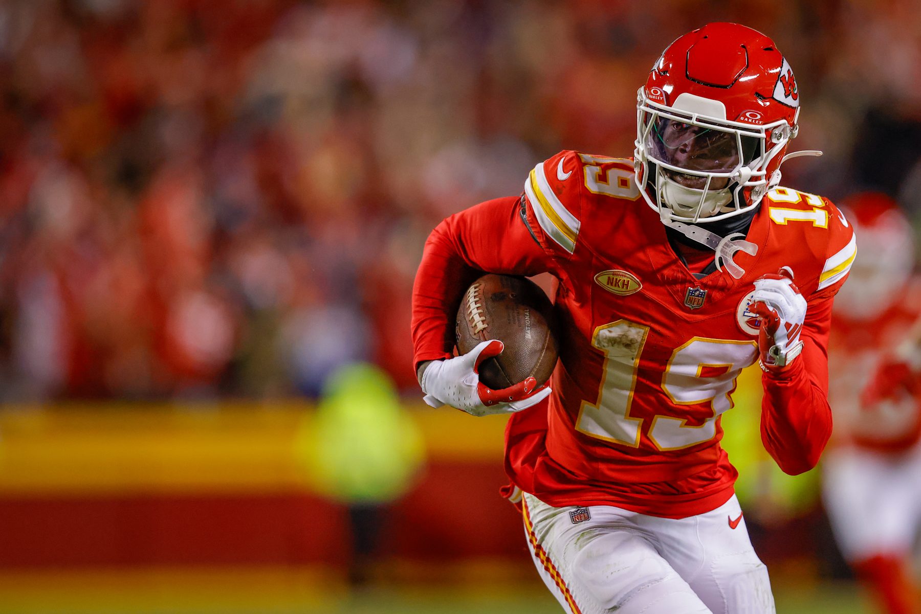 KANSAS CITY, MISSOURI - DECEMBER 10: Kadarius Toney #19 of the Kansas City Chiefs runs for a touchdown on a pass play negated by a penalty on Toney during the fourth quarter against the Buffalo Bills at GEHA Field at Arrowhead Stadium on December 10, 2023 in Kansas City, Missouri. (Photo by David Eulitt/Getty Images)