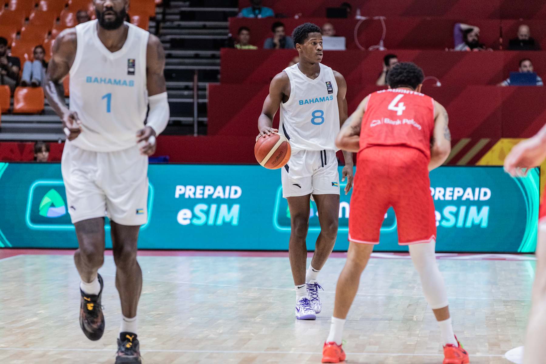 VALENCIA, SPAIN - 2024/07/03: V.J. Edgecombe (L) of Bahamas and A.J. Slaughter (R) of Poland in action during the Olympic Qualifying Tournament match between Bahamas and Poland at Pabellon Fuente de San Luis. Final score: Bahamas 90-81 Poland. (Photo by Nicholas Muller/SOPA Images/LightRocket via Getty Images)